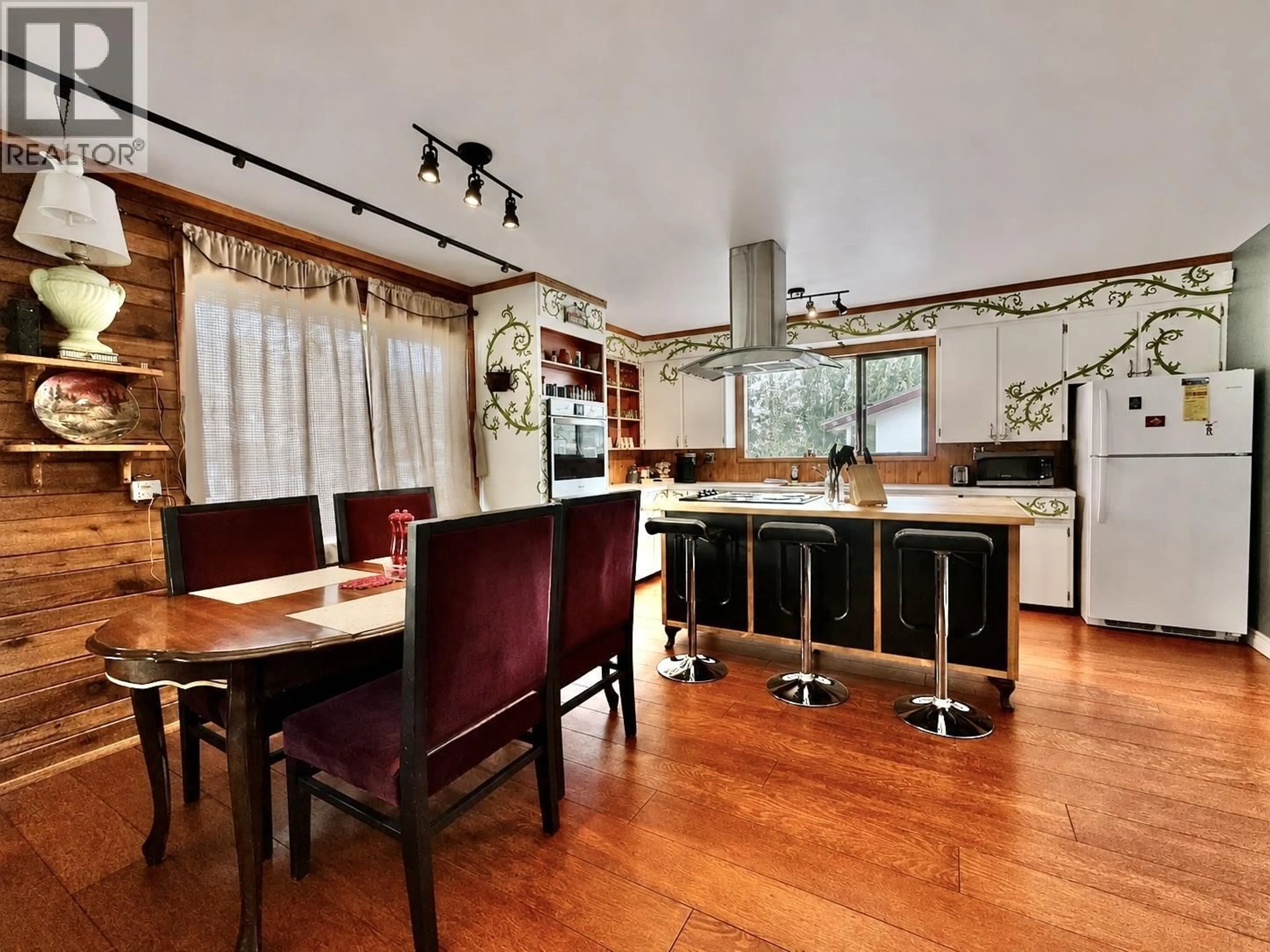Open concept kitchen, wood/laminate floor for 1343 7TH AVENUE, Valemount British Columbia V0E2Z0
