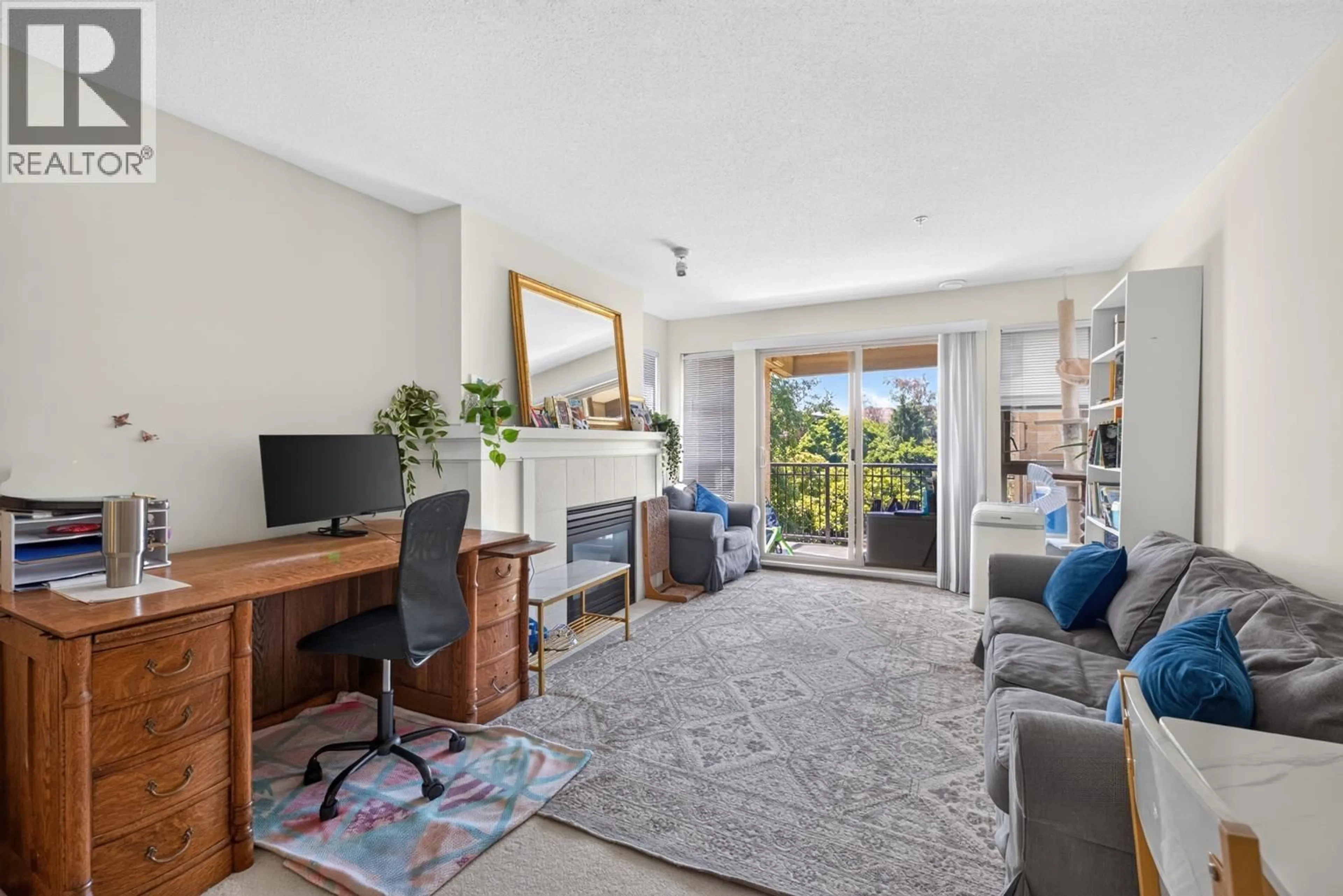 Living room with furniture, unknown for 311 - 5725 AGRONOMY ROAD, Vancouver British Columbia V6T1L9
