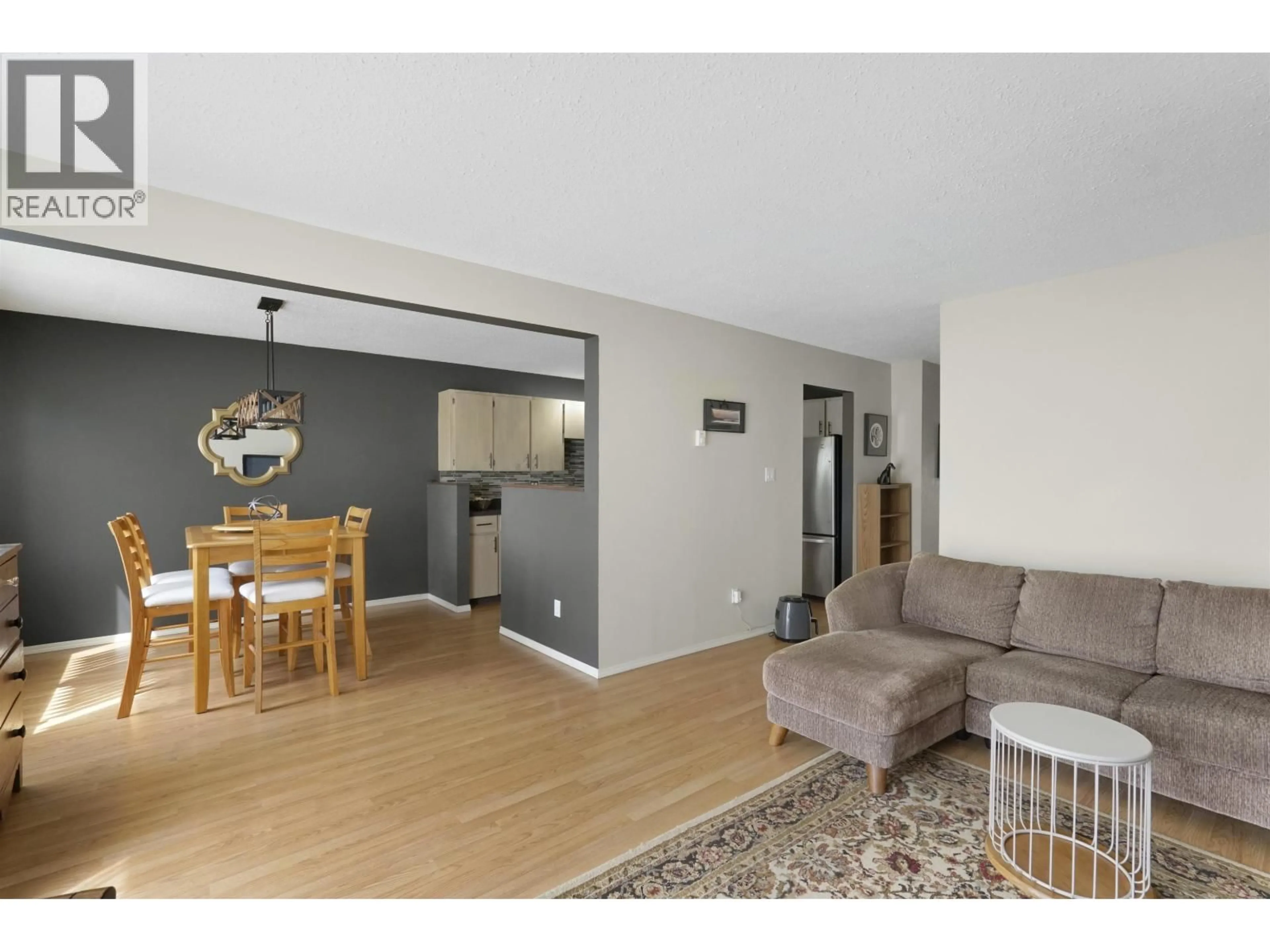 Living room with furniture, wood/laminate floor for 45 HALLMAN STREET, Kitimat British Columbia V8C2P9