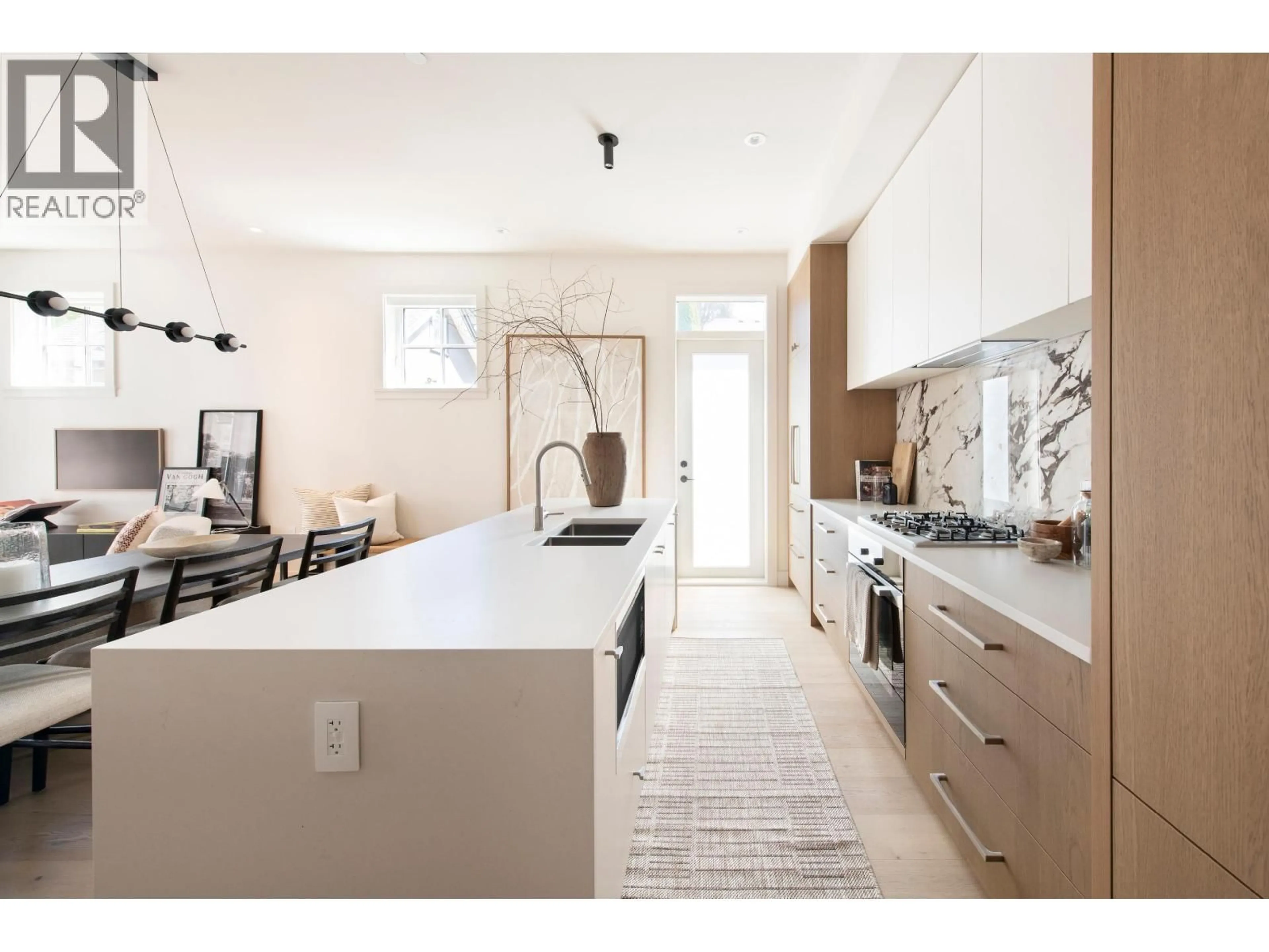 Open concept kitchen, ceramic/tile floor for 2 - 2115 W 18TH AVENUE, Vancouver British Columbia V6L1A3