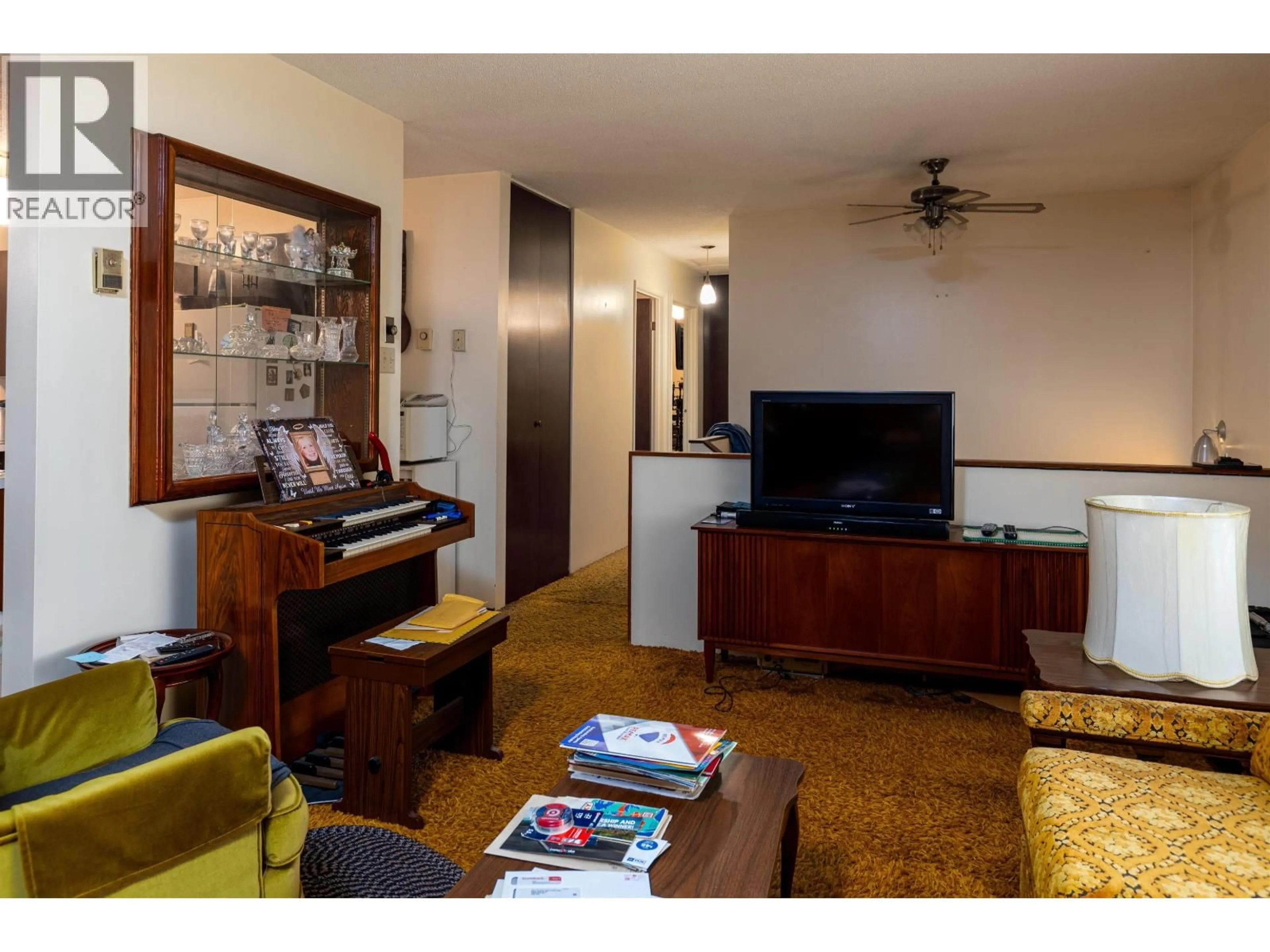 Living room with furniture, wood/laminate floor for 2406 APPLE STREET, Terrace British Columbia V8G4J3