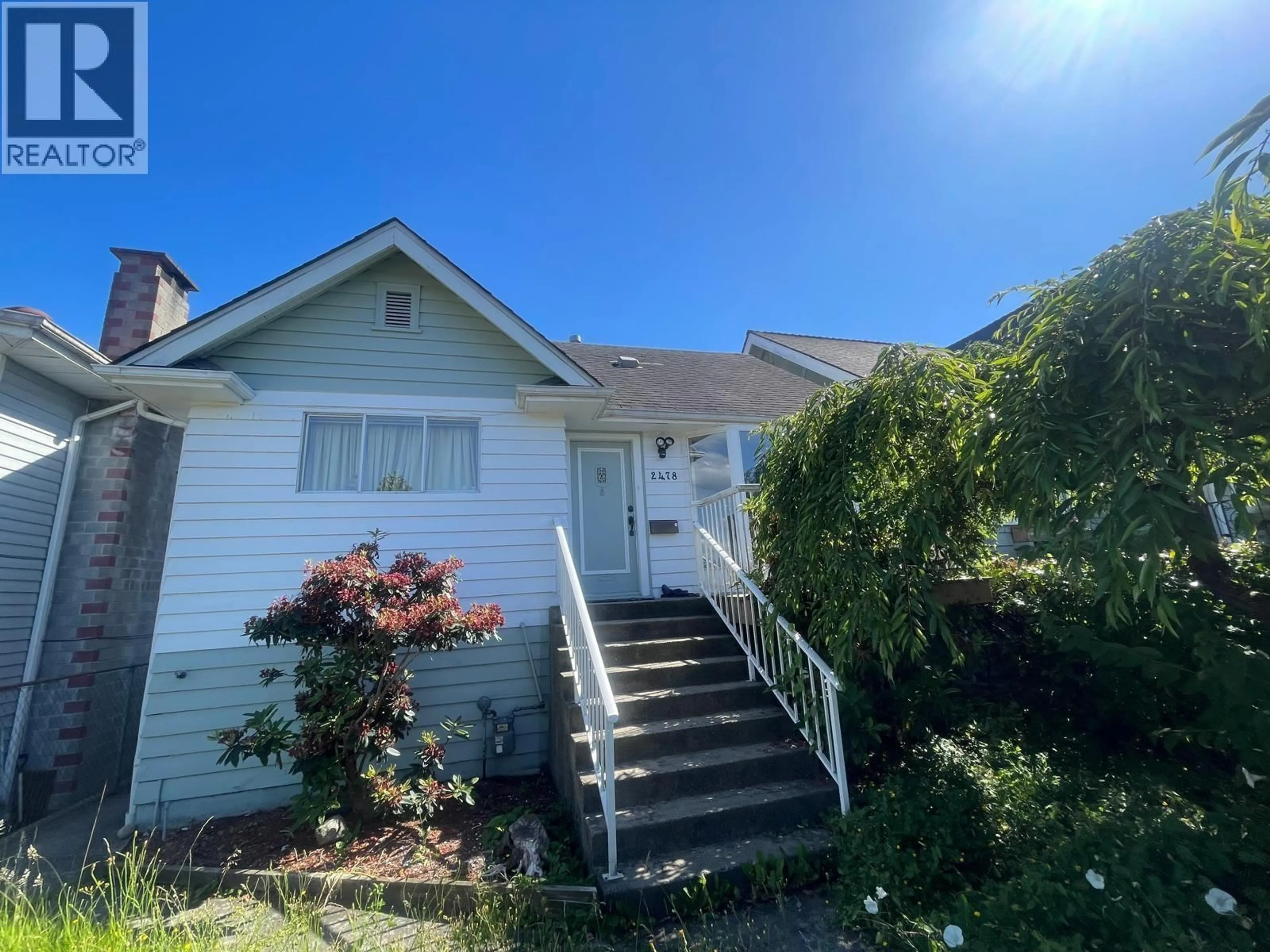 Home with vinyl exterior material, street for 2478 28TH AVENUE, Vancouver British Columbia V5R1R4