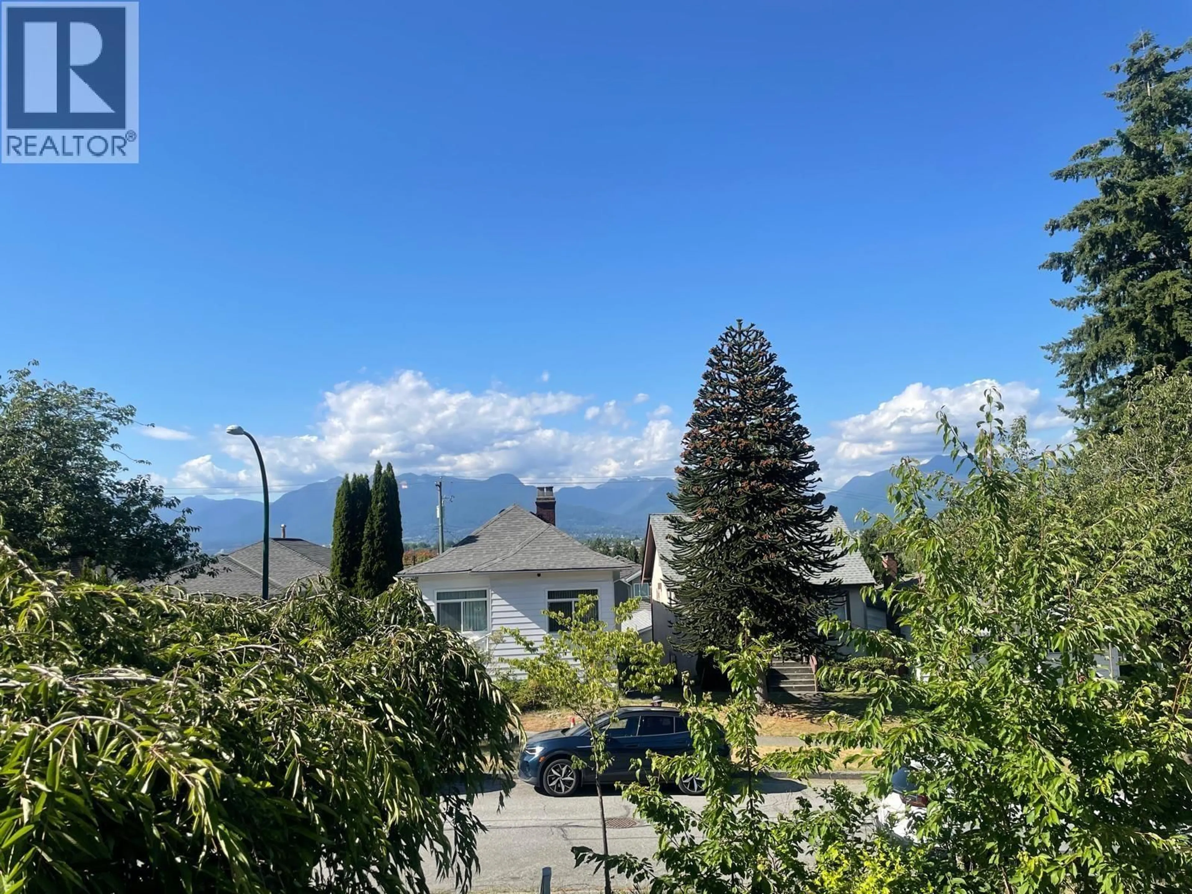 A pic from outside/outdoor area/front of a property/back of a property/a pic from drone, mountain view for 2478 28TH AVENUE, Vancouver British Columbia V5R1R4
