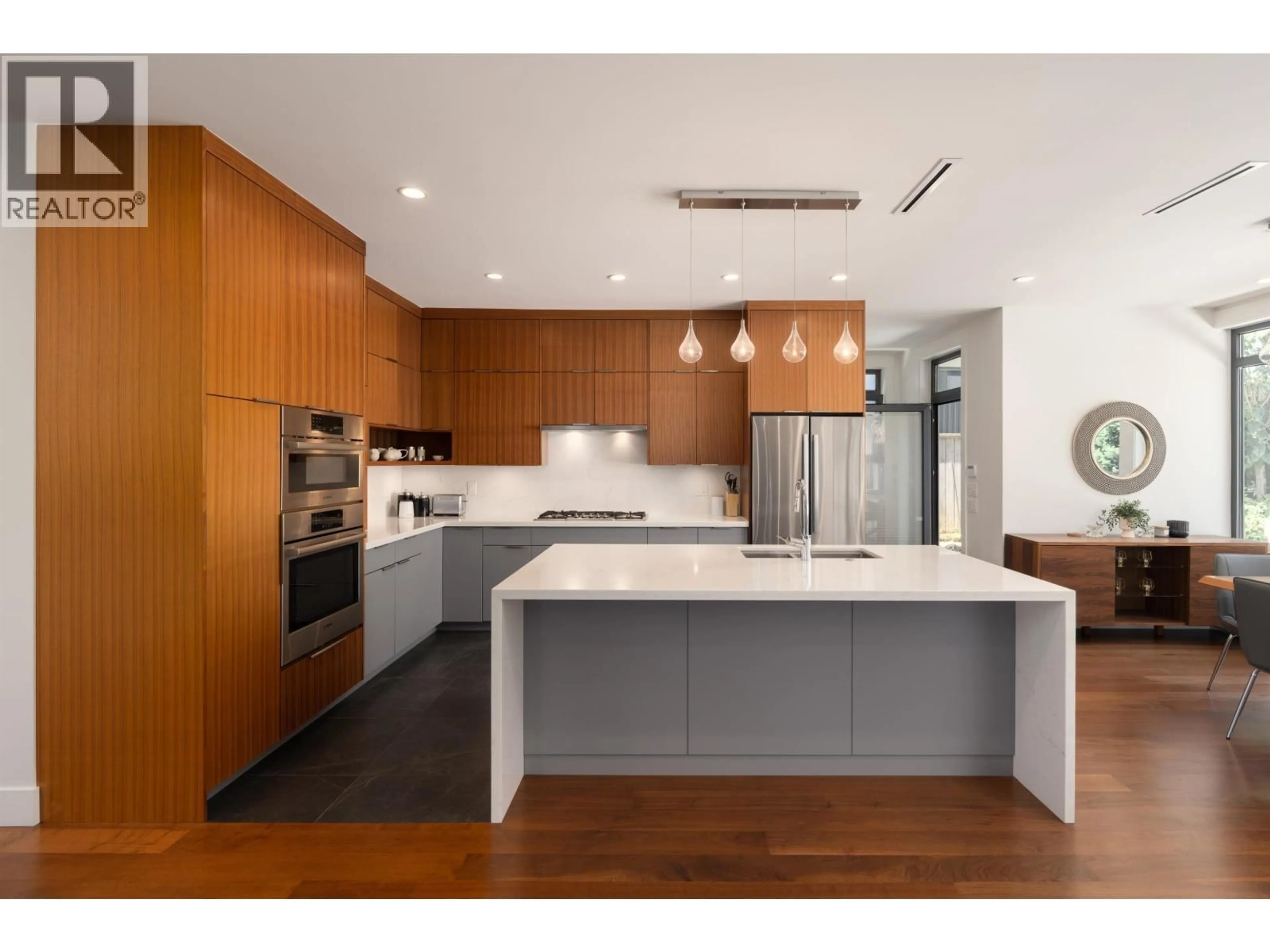 Contemporary kitchen, wood/laminate floor for 812 6TH STREET, North Vancouver British Columbia V7L1R7