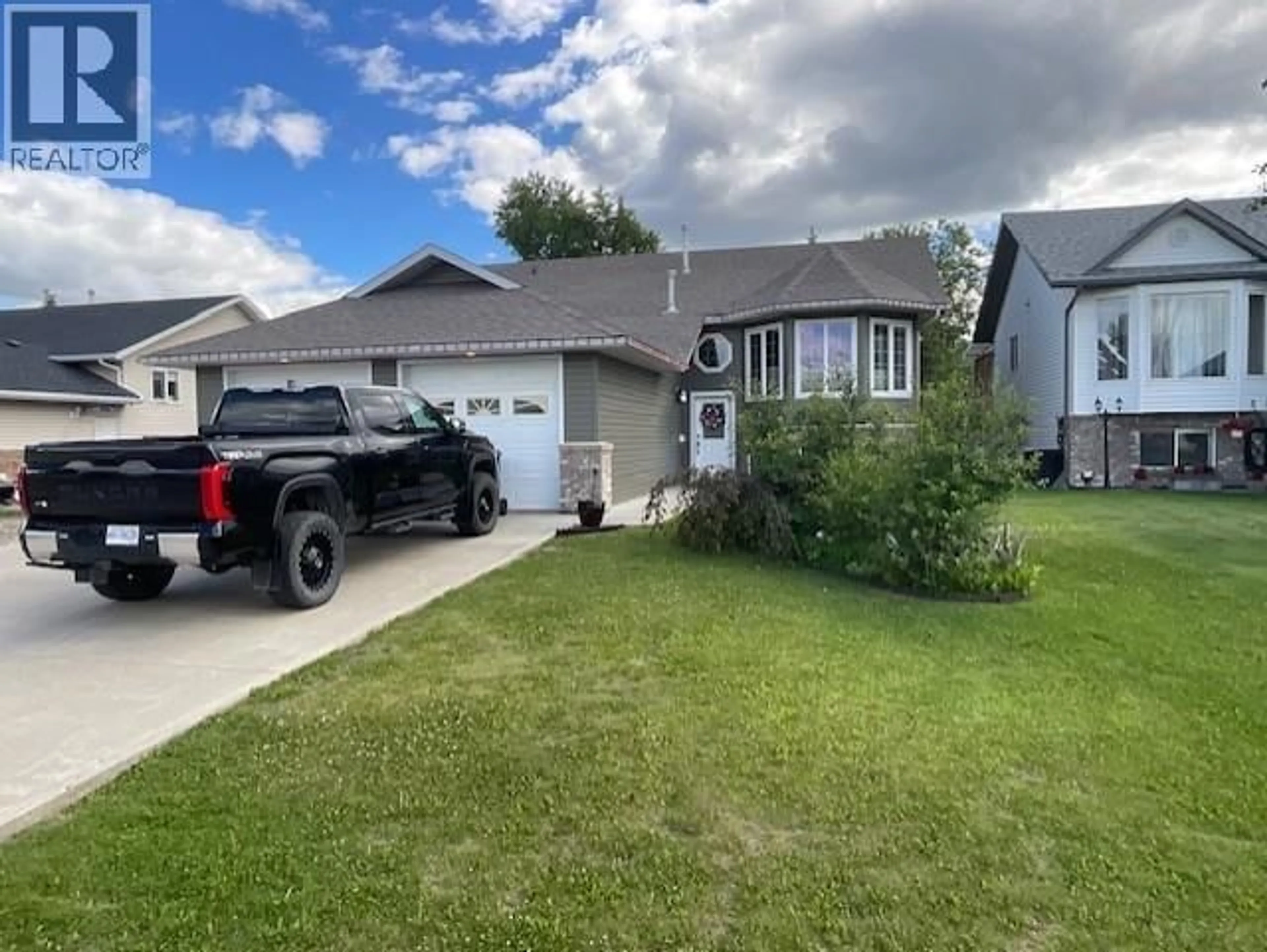 A pic from outside/outdoor area/front of a property/back of a property/a pic from drone, street for 9903 114A AVENUE, Fort St. John British Columbia V1J7B7