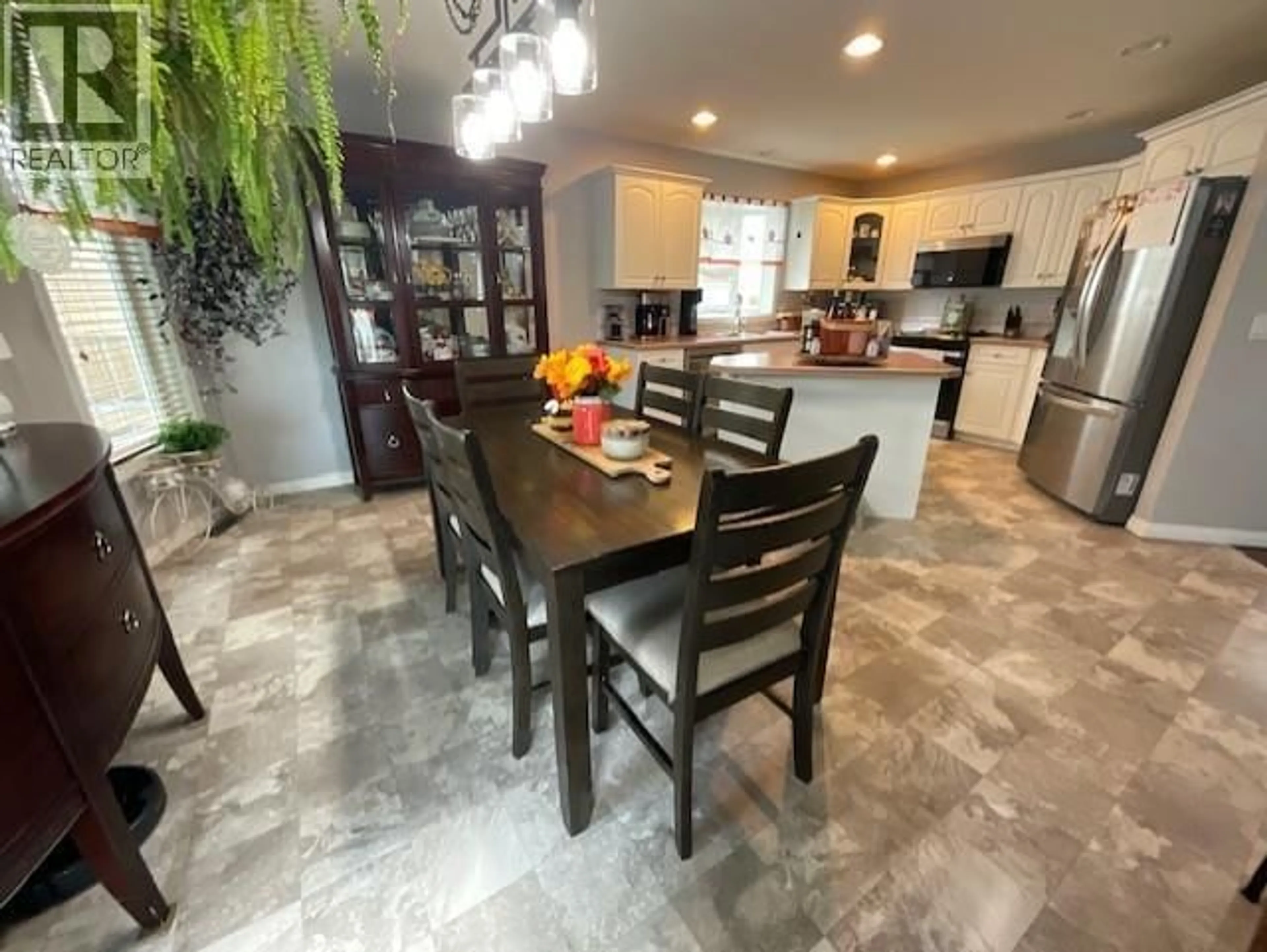 Open concept kitchen, ceramic/tile floor for 9903 114A AVENUE, Fort St. John British Columbia V1J7B7