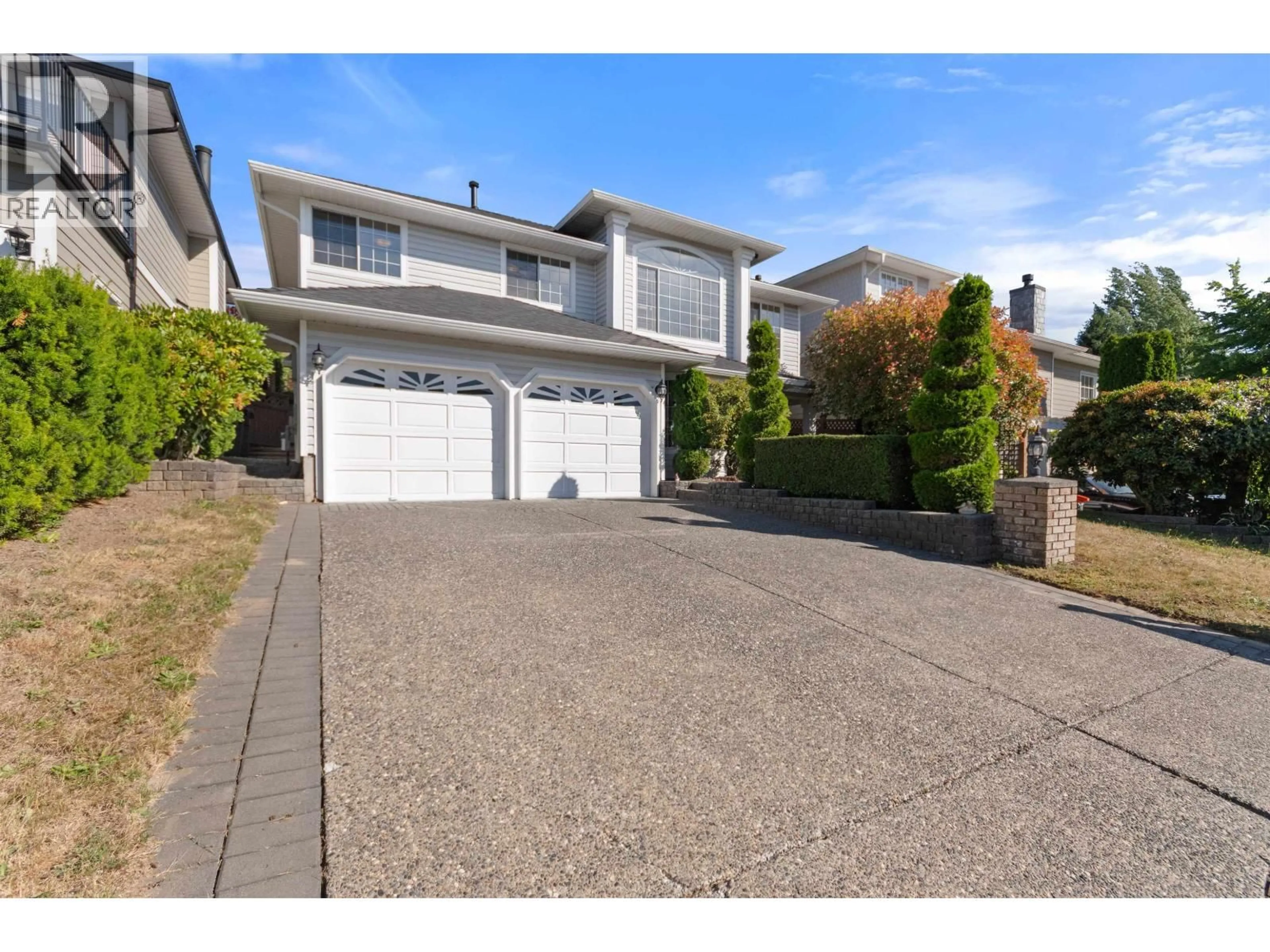 Home with vinyl exterior material, street for 1258 BENNECK WAY, Port Coquitlam British Columbia V3C5Y8