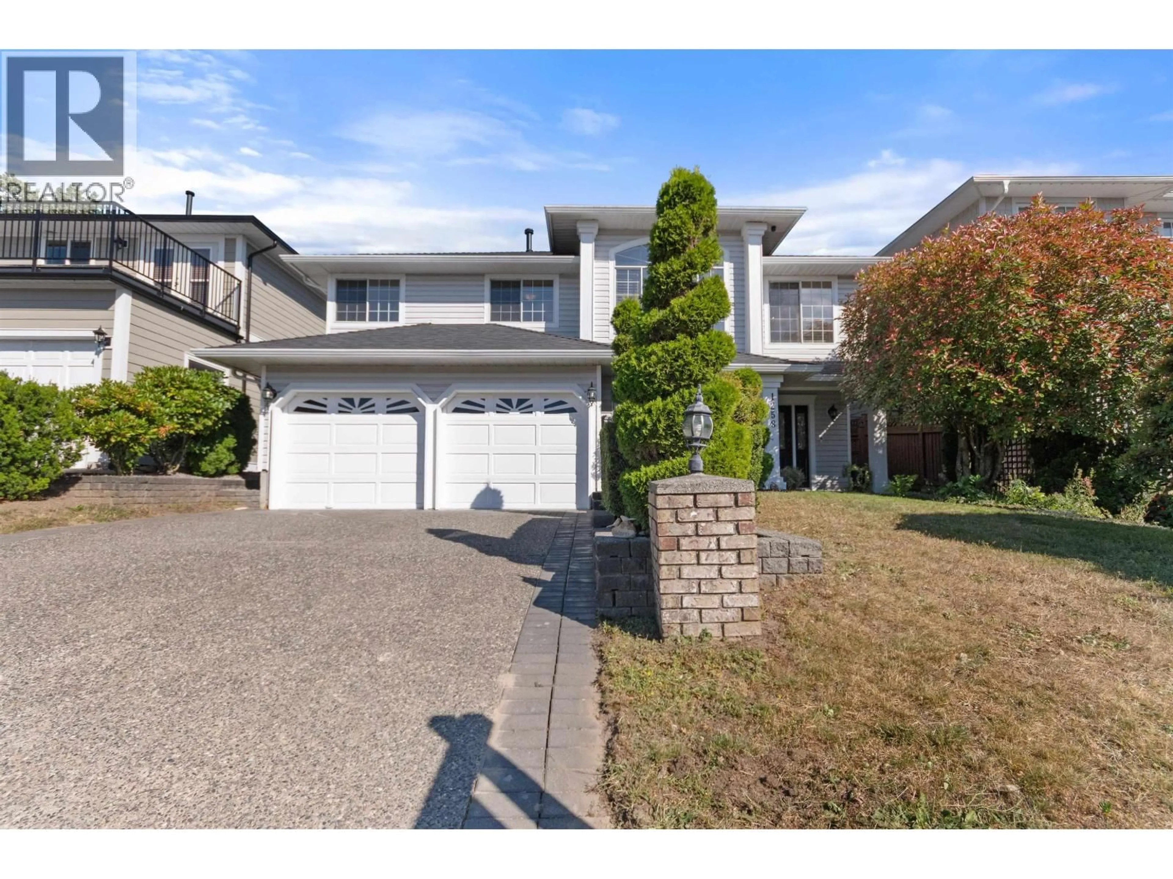 Home with vinyl exterior material, street for 1258 BENNECK WAY, Port Coquitlam British Columbia V3C5Y8