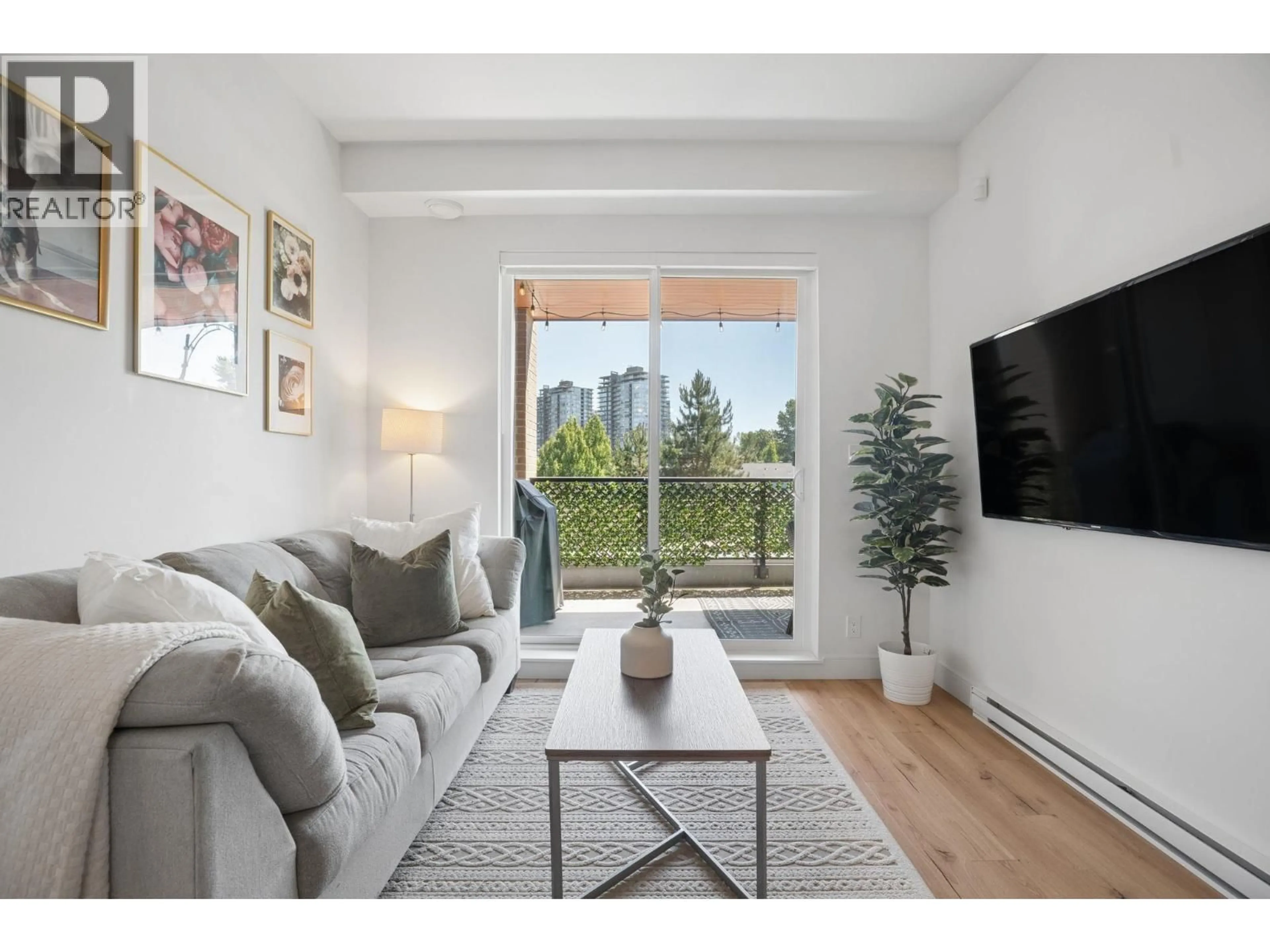 Living room with furniture, wood/laminate floor for 326 - 55 KLAHANIE DRIVE, Port Moody British Columbia V3H0M9