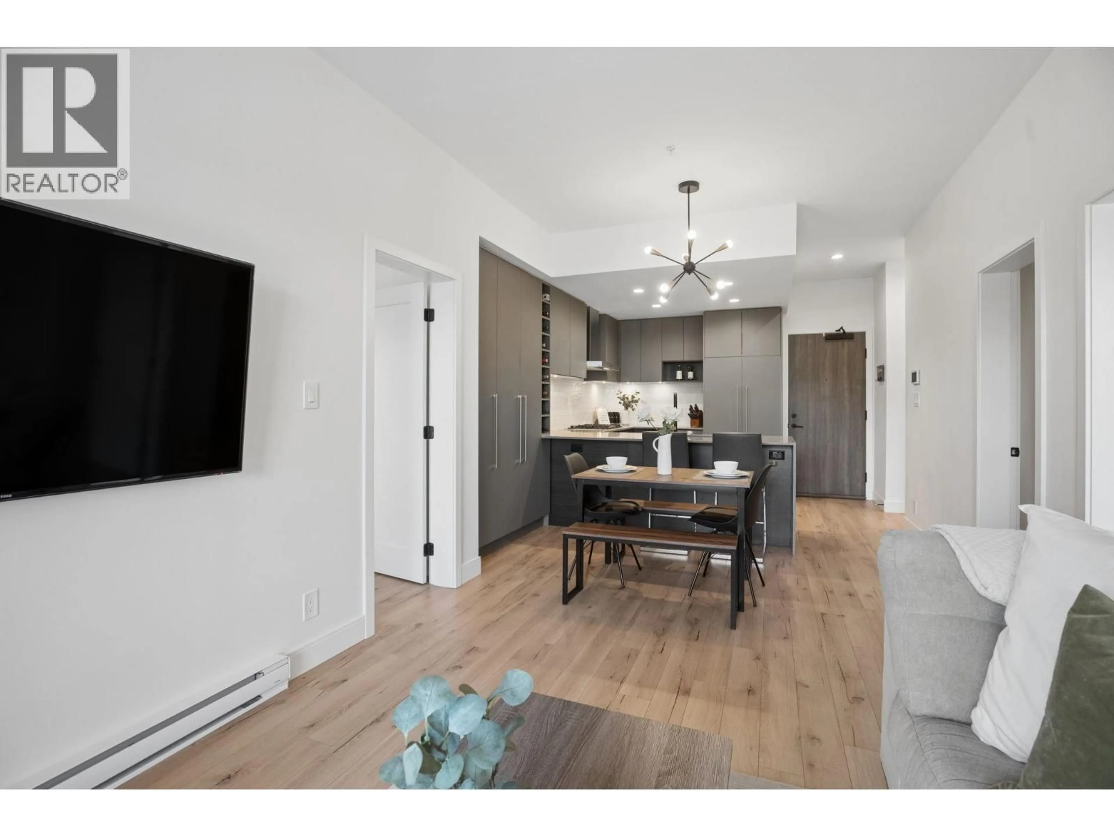 Open concept kitchen, wood/laminate floor for 326 - 55 KLAHANIE DRIVE, Port Moody British Columbia V3H0M9