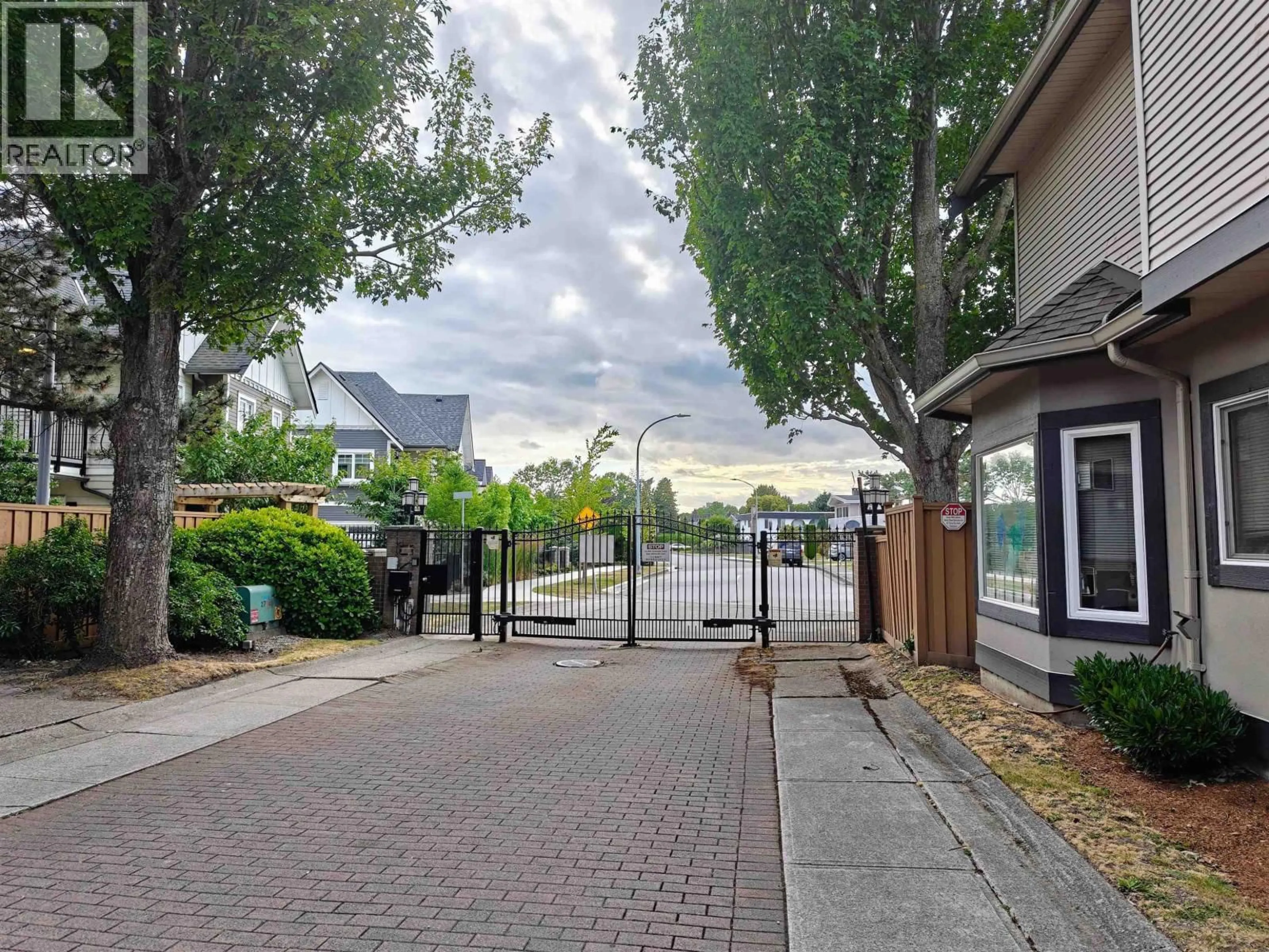 A pic from outside/outdoor area/front of a property/back of a property/a pic from drone, street for 25 - 11888 MELLIS DRIVE, Richmond British Columbia V6X1M1