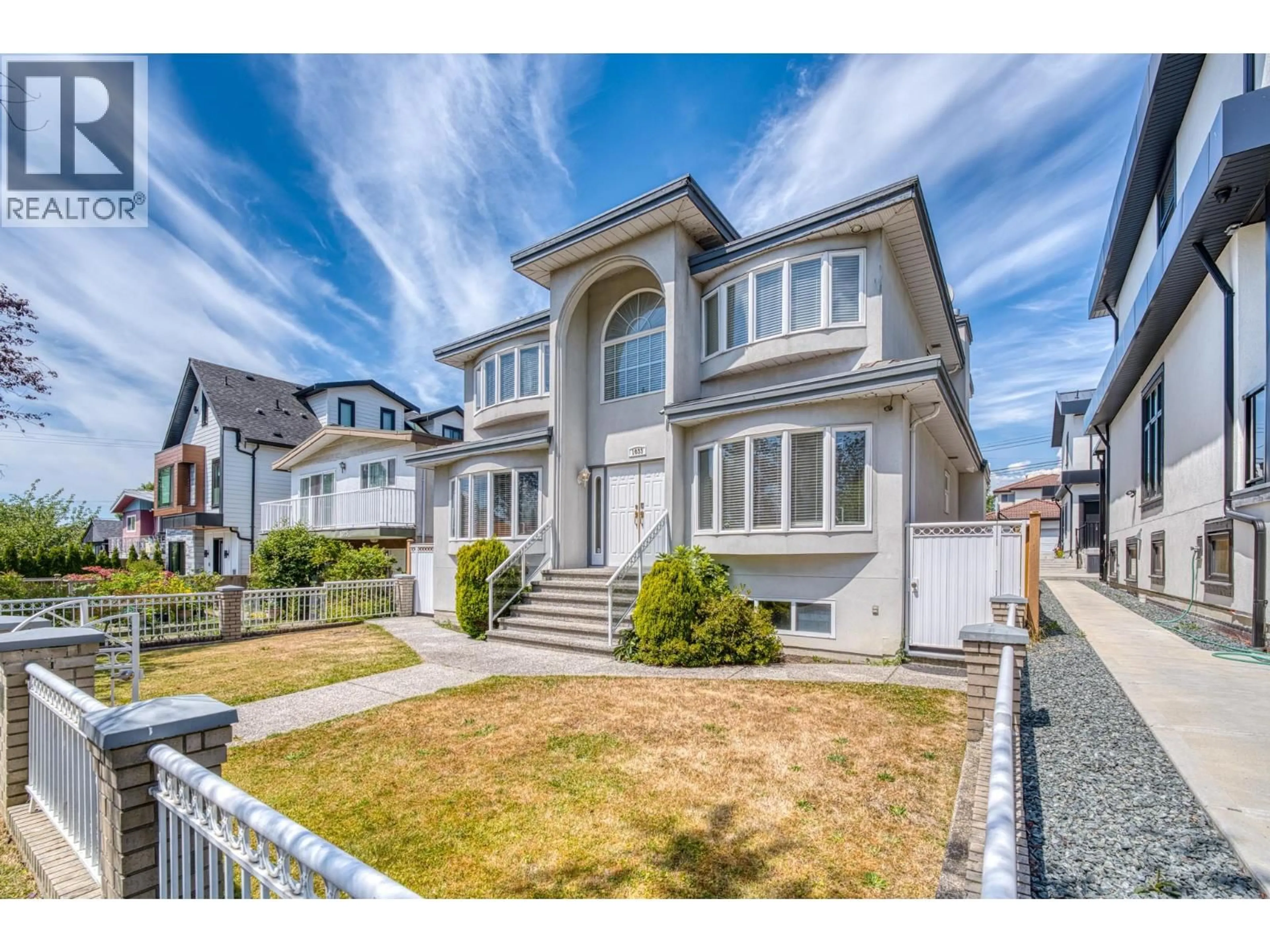 Home with vinyl exterior material, street for 1033 39TH AVENUE, Vancouver British Columbia V5W1K9