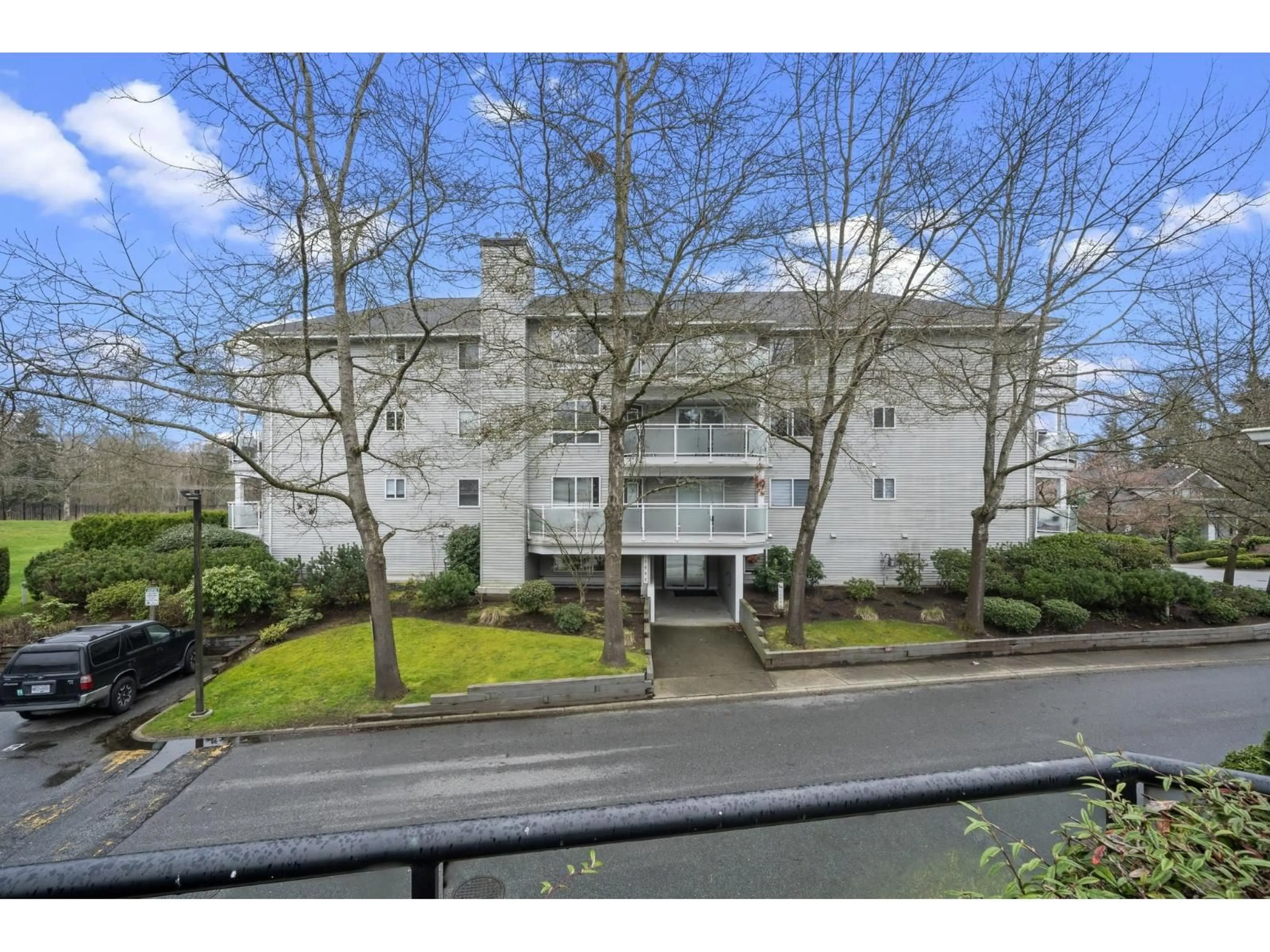 A pic from outside/outdoor area/front of a property/back of a property/a pic from drone, street for 205 - 13680 84 AVENUE, Surrey British Columbia V3W0T6