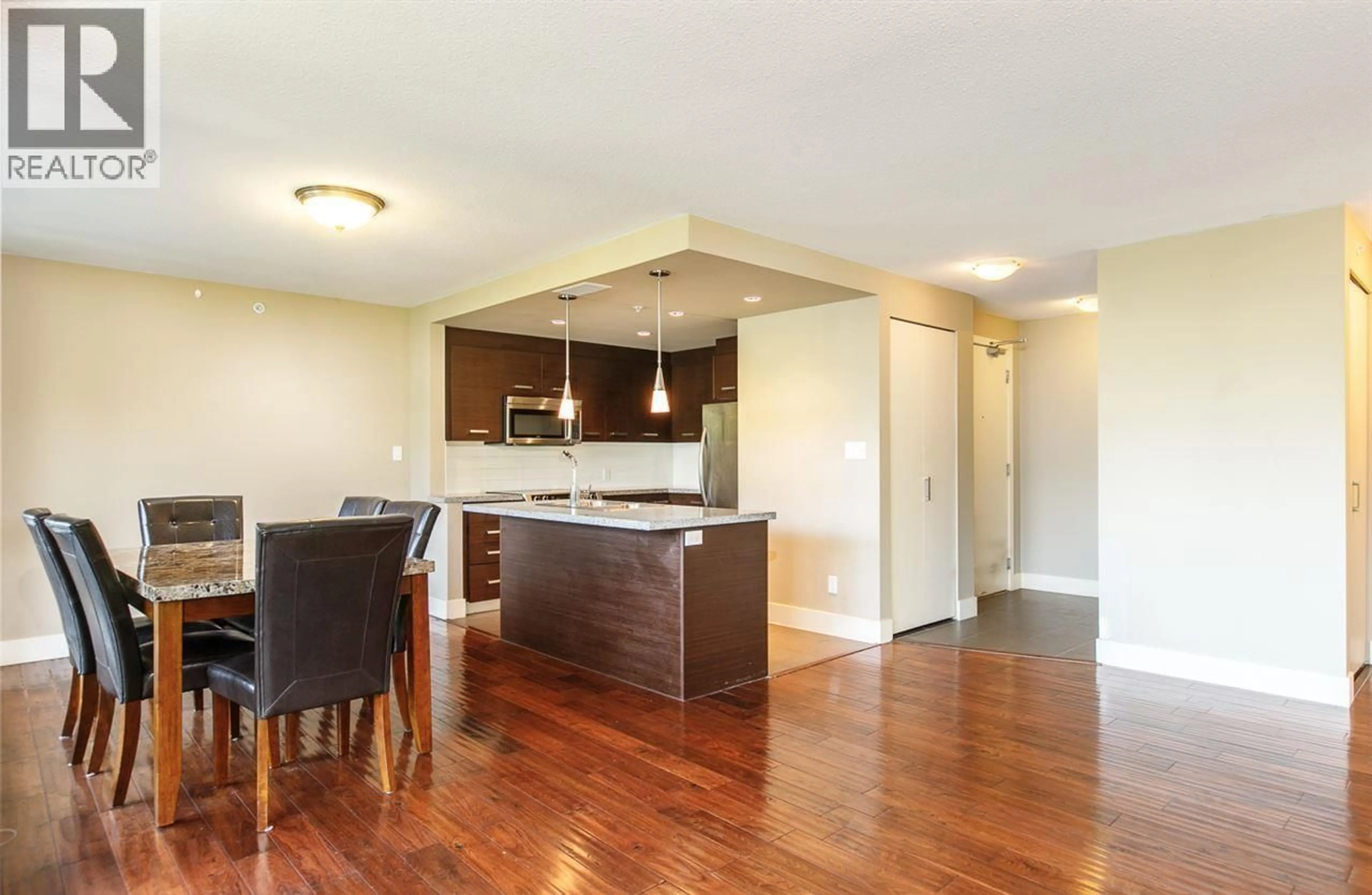 Open concept kitchen, wood/laminate floor for 301 - 2959 GLEN DRIVE, Coquitlam British Columbia V3B0B8