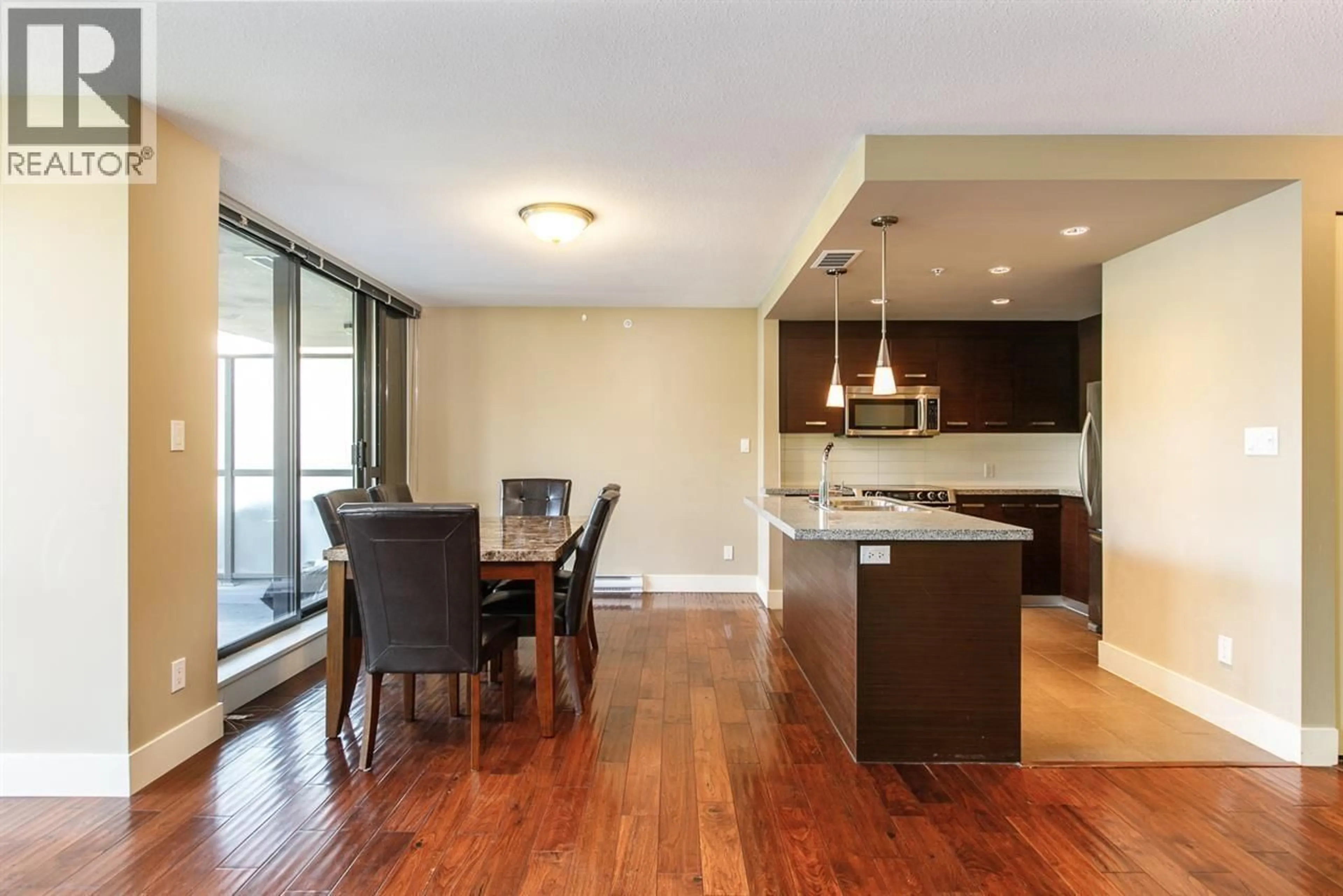 Open concept kitchen, wood/laminate floor for 301 - 2959 GLEN DRIVE, Coquitlam British Columbia V3B0B8