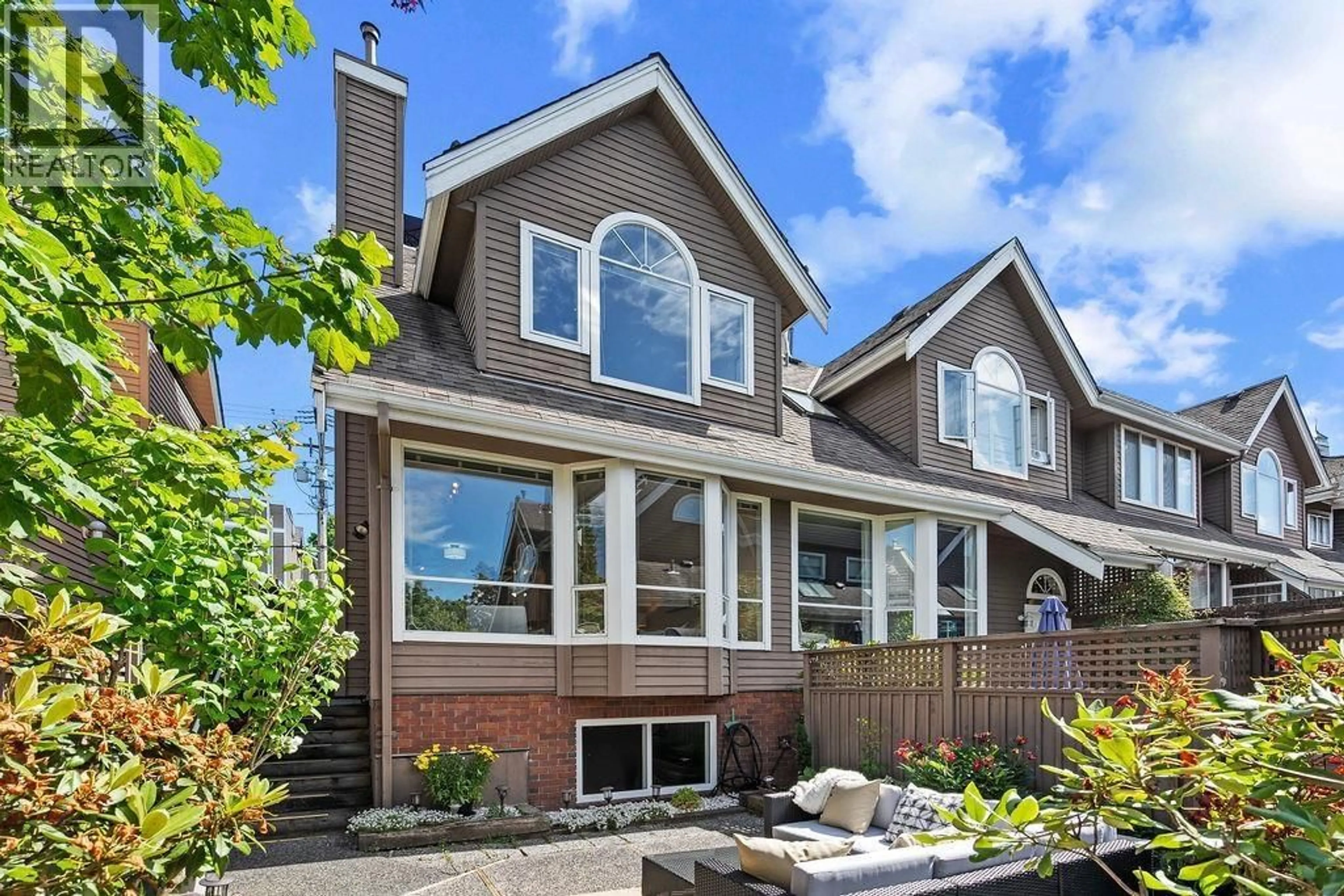Home with brick exterior material, unknown for 1 - 230 KEITH ROAD, North Vancouver British Columbia V7L1V5