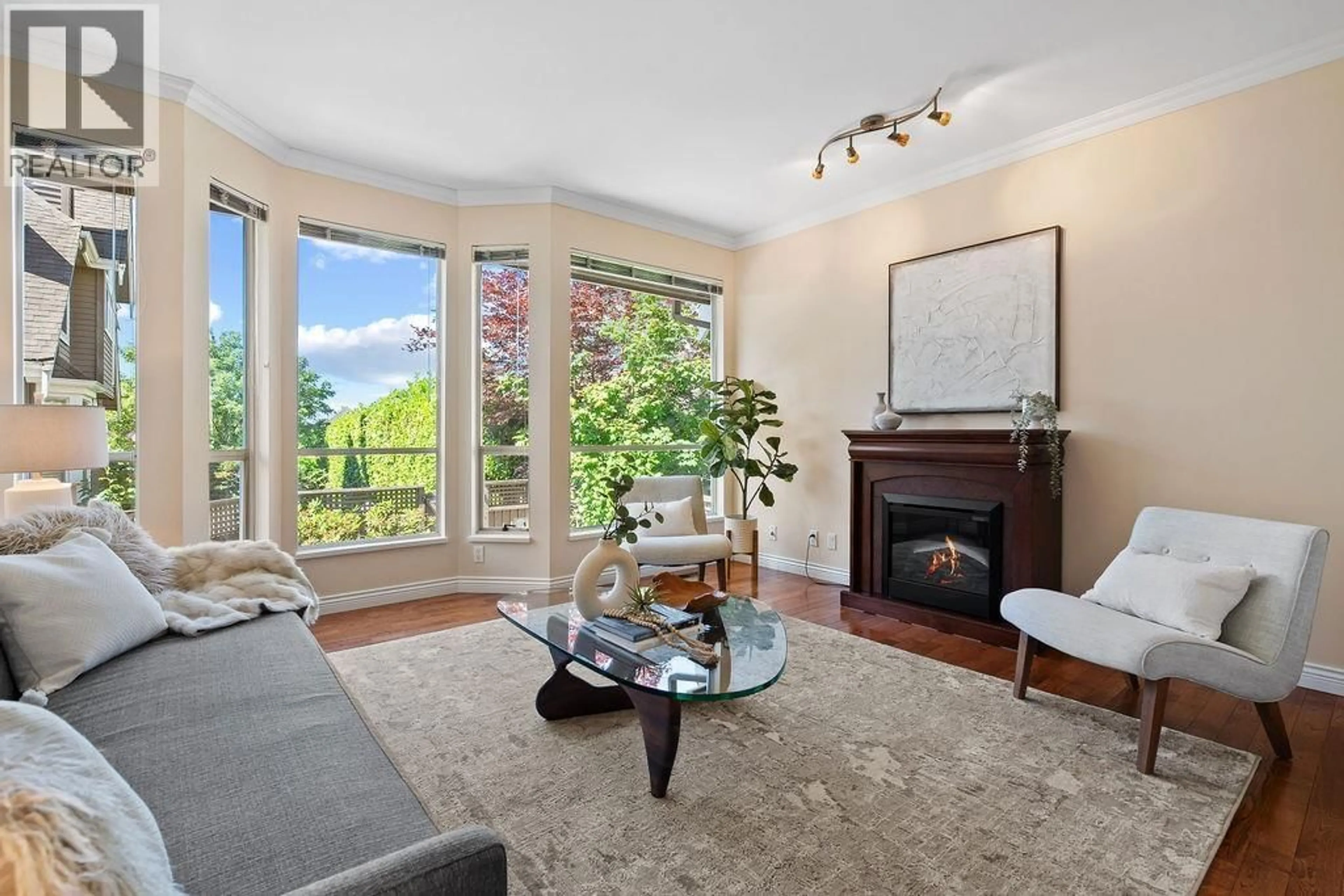 Living room with furniture, unknown for 1 - 230 KEITH ROAD, North Vancouver British Columbia V7L1V5