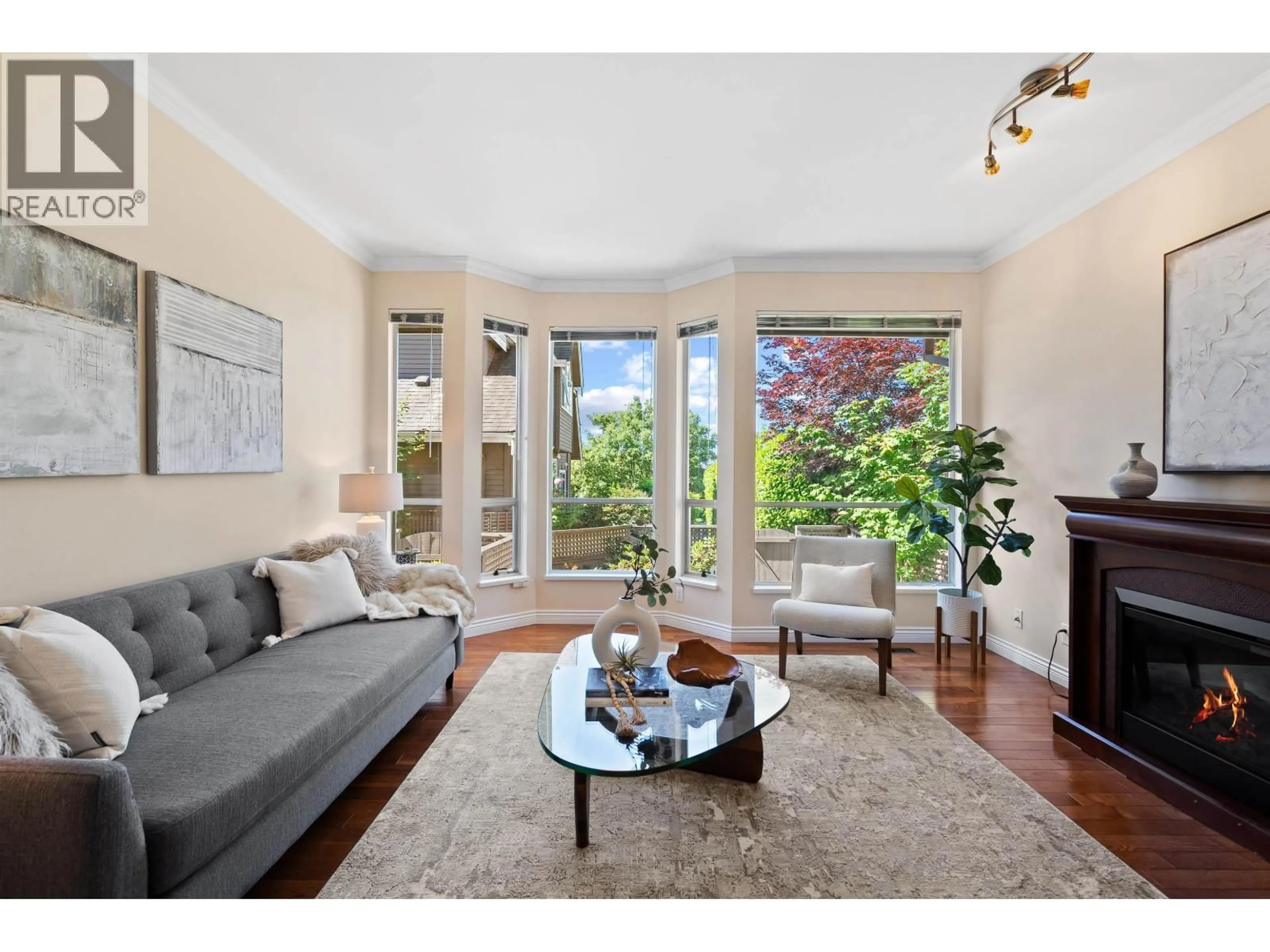 Living room with furniture, unknown for 1 - 230 KEITH ROAD, North Vancouver British Columbia V7L1V5