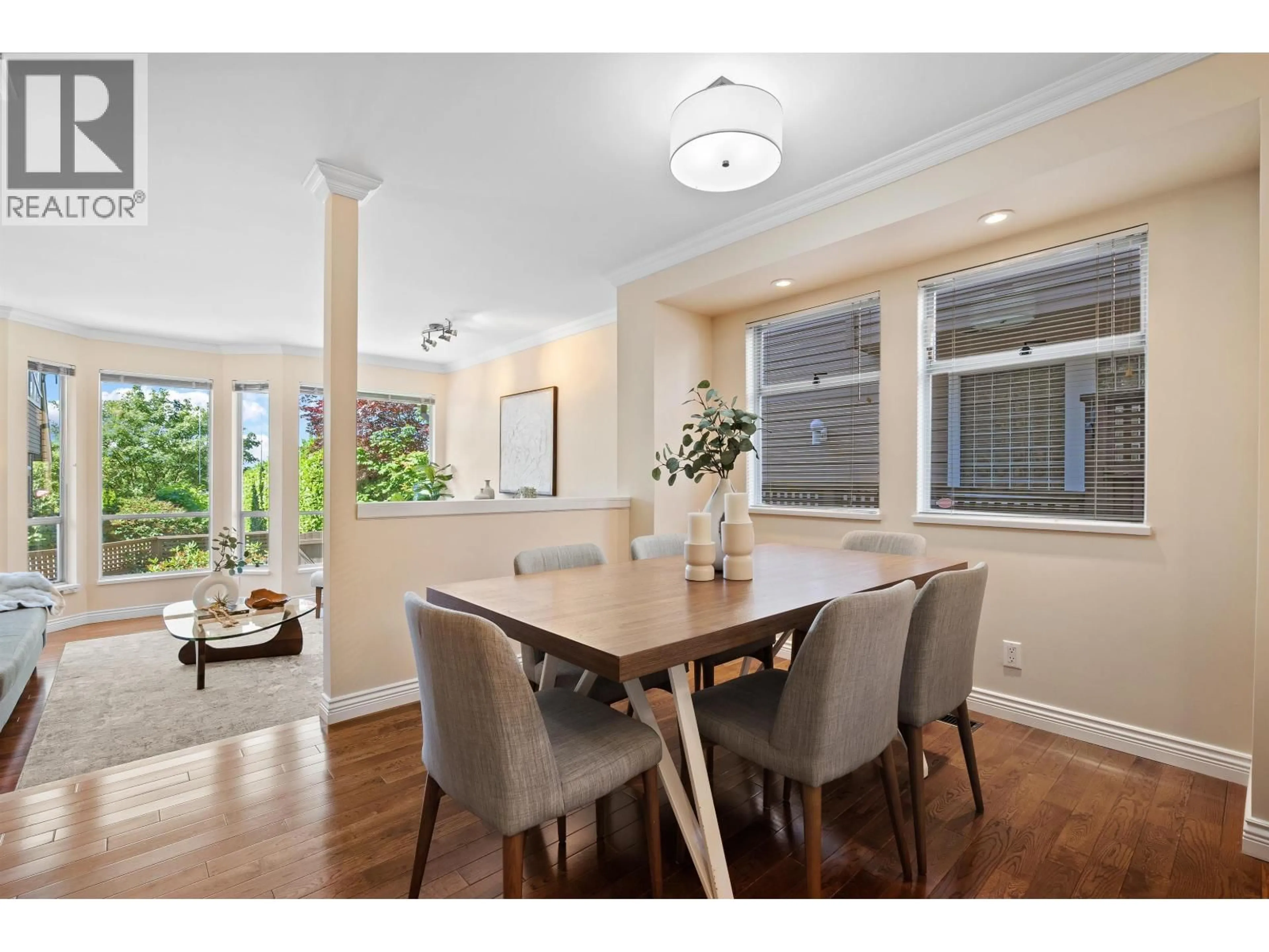 Dining room, wood/laminate floor for 1 - 230 KEITH ROAD, North Vancouver British Columbia V7L1V5