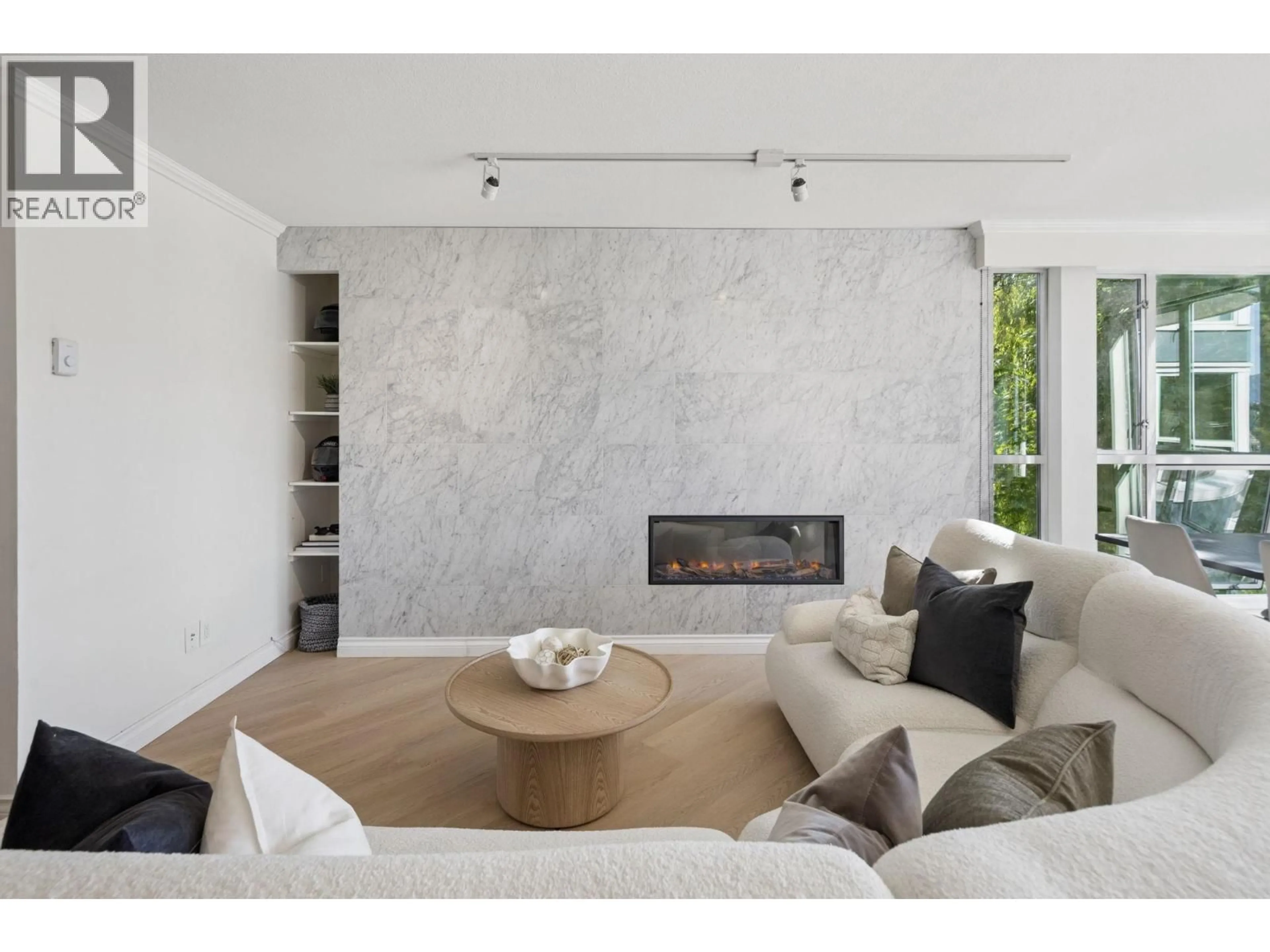 Living room with furniture, ceramic/tile floor for 301 - 1502 ISLAND PARK WALK, Vancouver British Columbia V6H3Z8