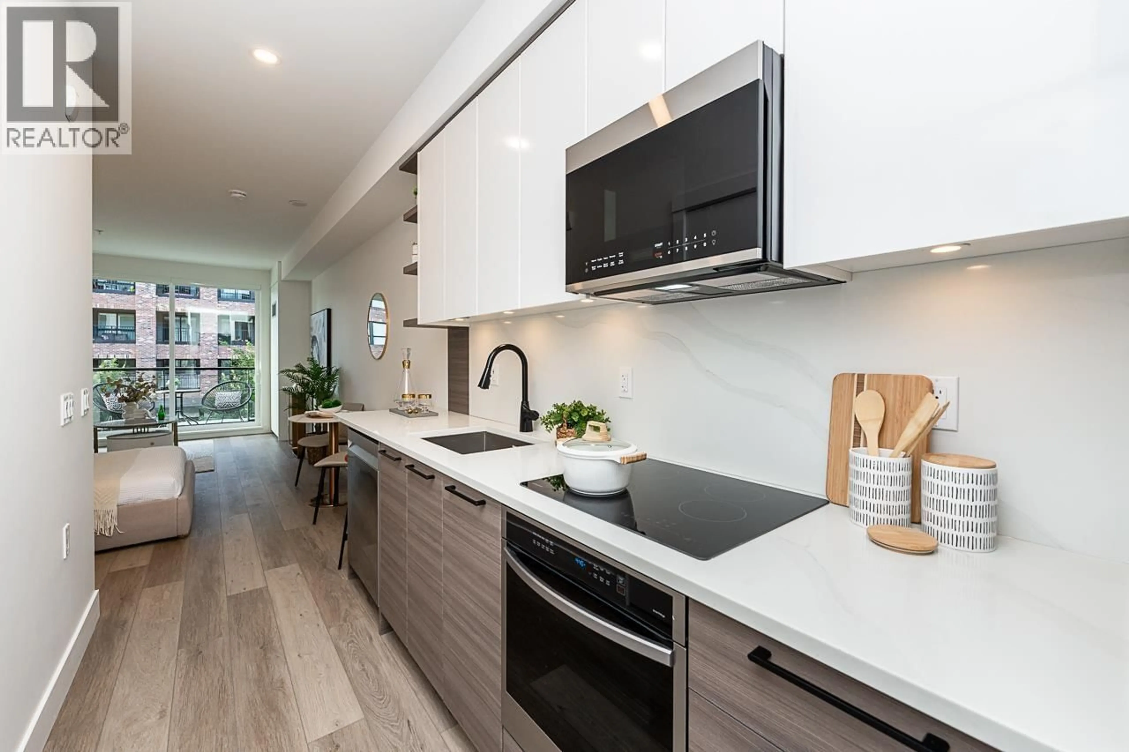 Open concept kitchen, unknown for 203 - 422 LAKEWOOD DRIVE, Vancouver British Columbia V5L0E8