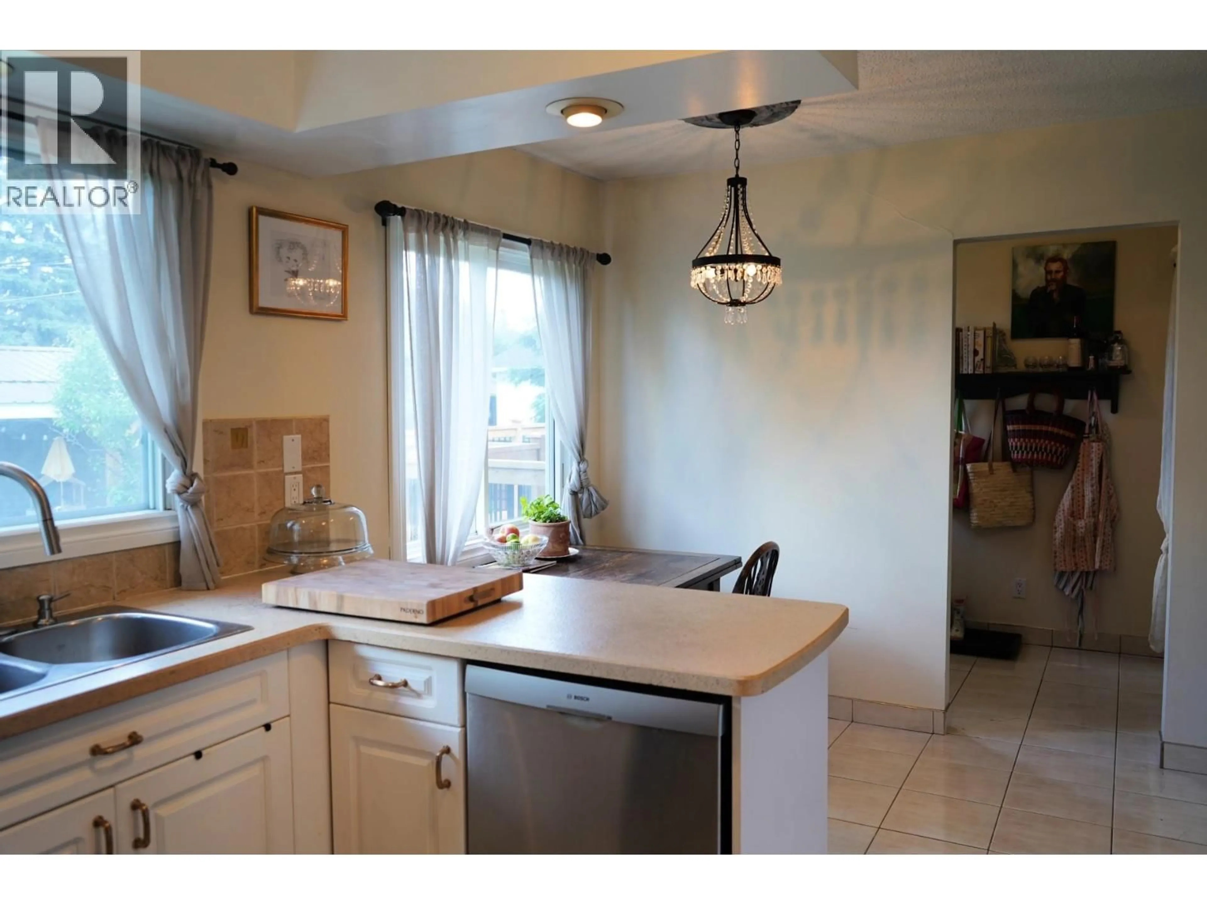 Standard kitchen, ceramic/tile floor for 9312 106 AVENUE, Fort St. John British Columbia V1J2N4