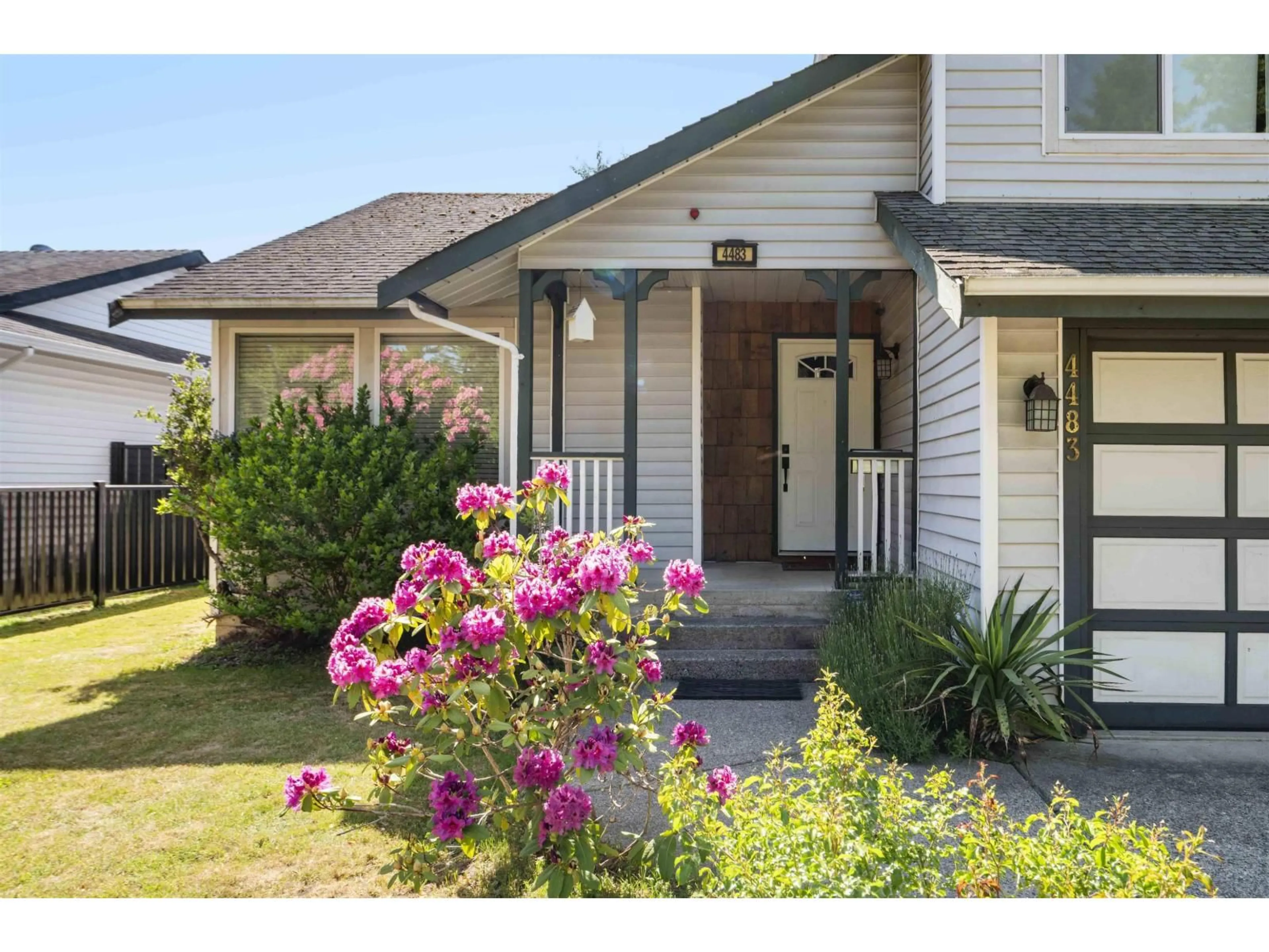 Home with vinyl exterior material, street for 4483 208 STREET, Langley British Columbia V3A2H7