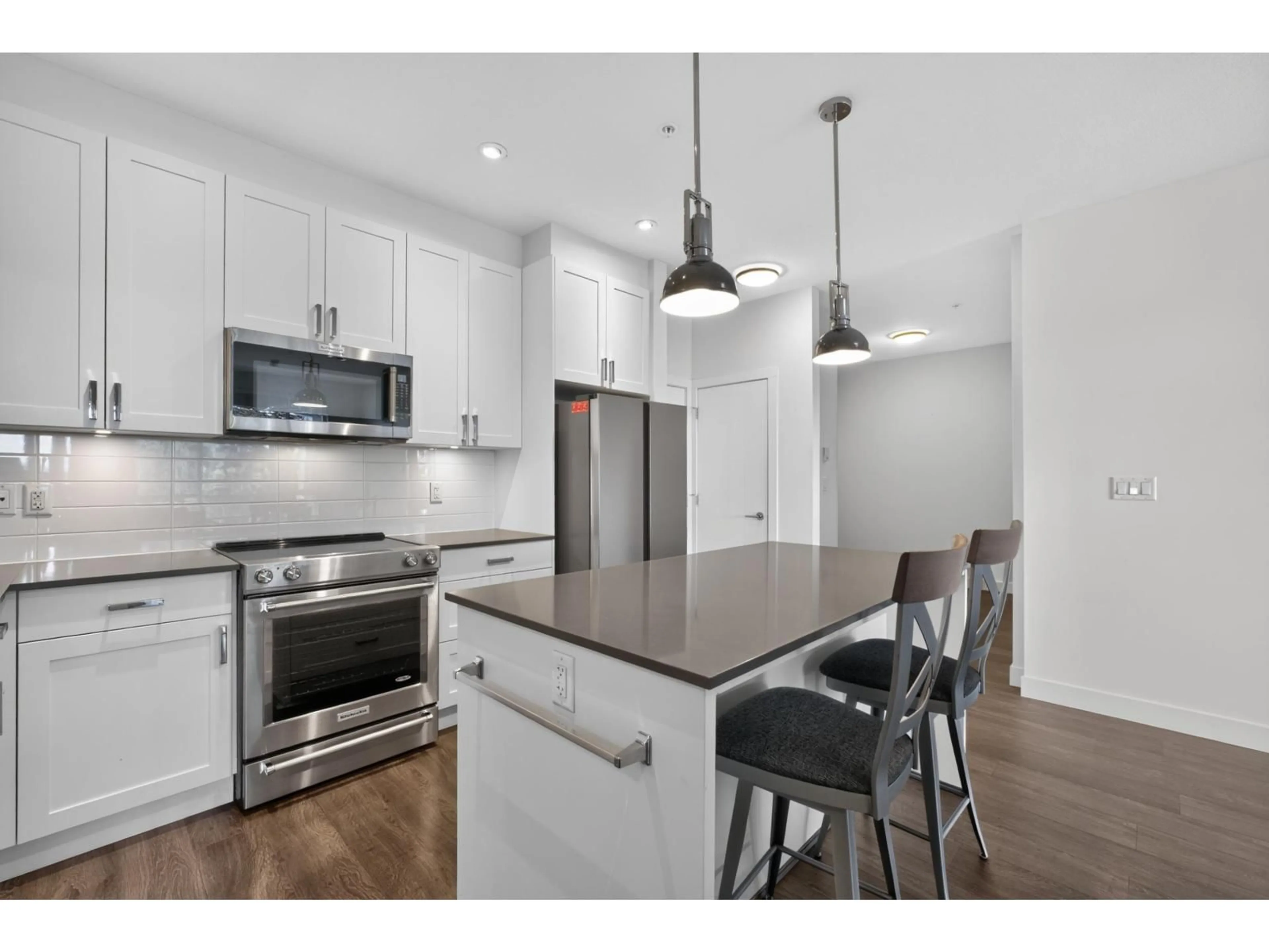 Open concept kitchen, unknown for 309 - 16380 64 AVENUE, Surrey British Columbia V3S6X6