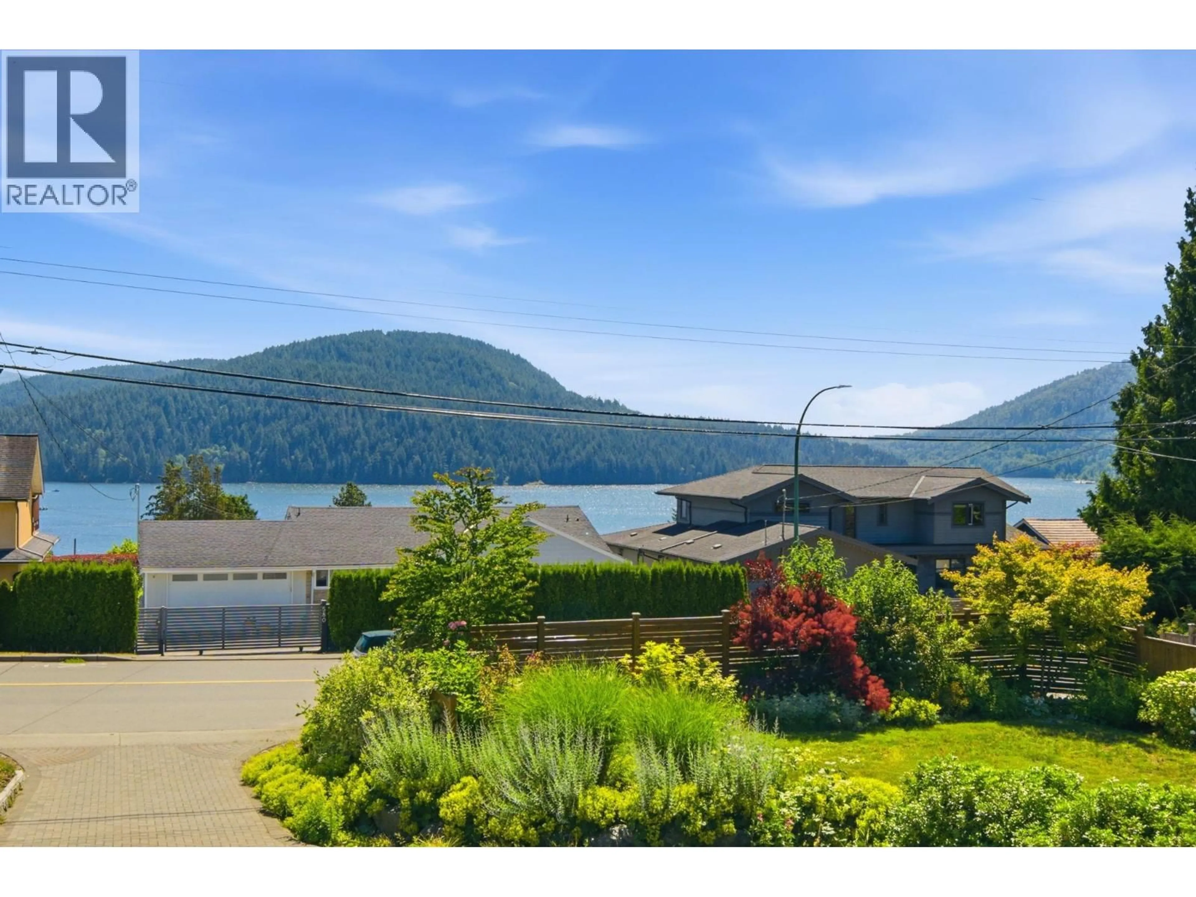 A pic from outside/outdoor area/front of a property/back of a property/a pic from drone, water/lake/river/ocean view for 575 DOLLARTON HIGHWAY, North Vancouver British Columbia V7G1N3