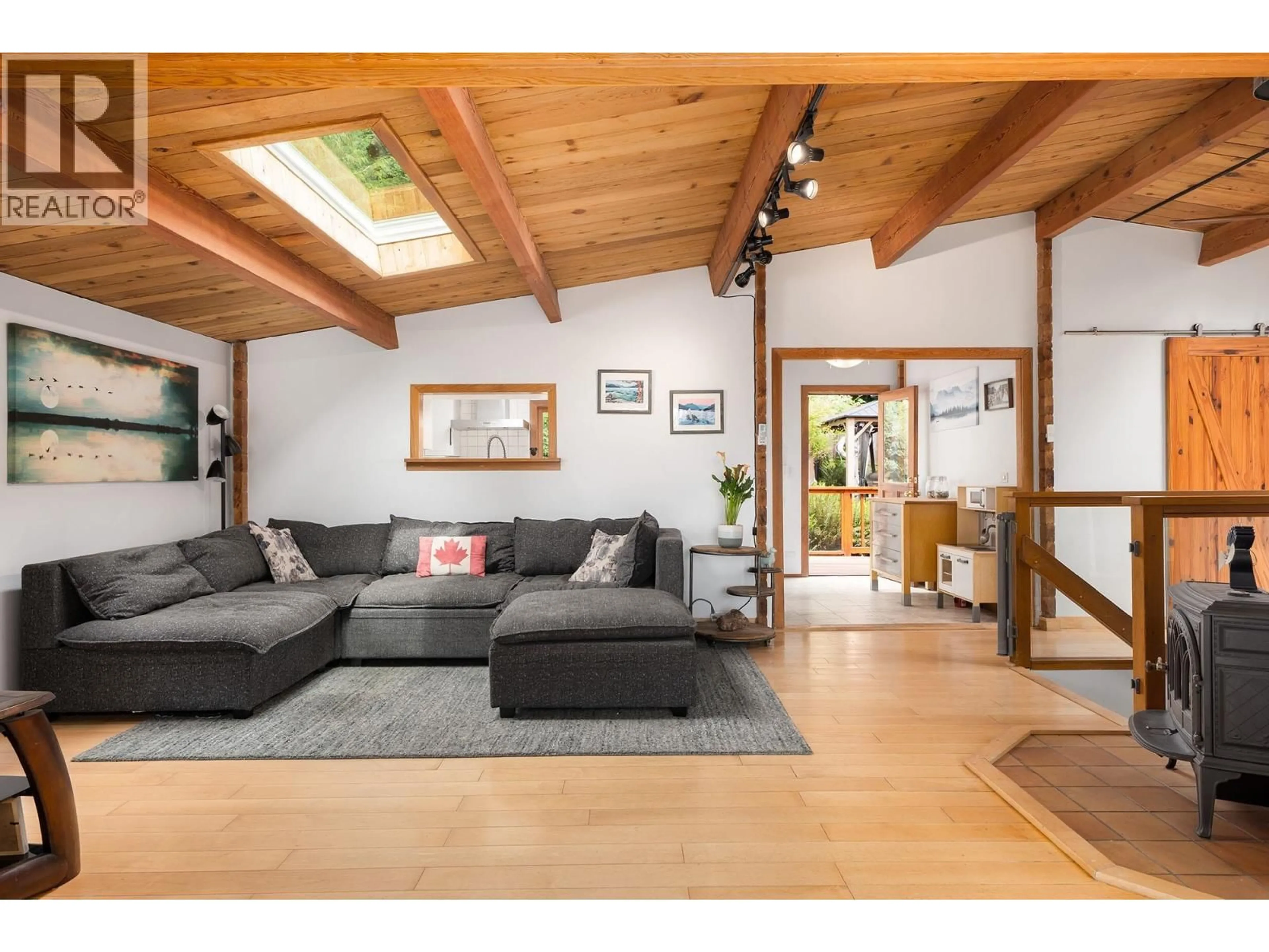 Living room with furniture, wood/laminate floor for 1222 MILLER ROAD, Bowen Island British Columbia V0N1G1