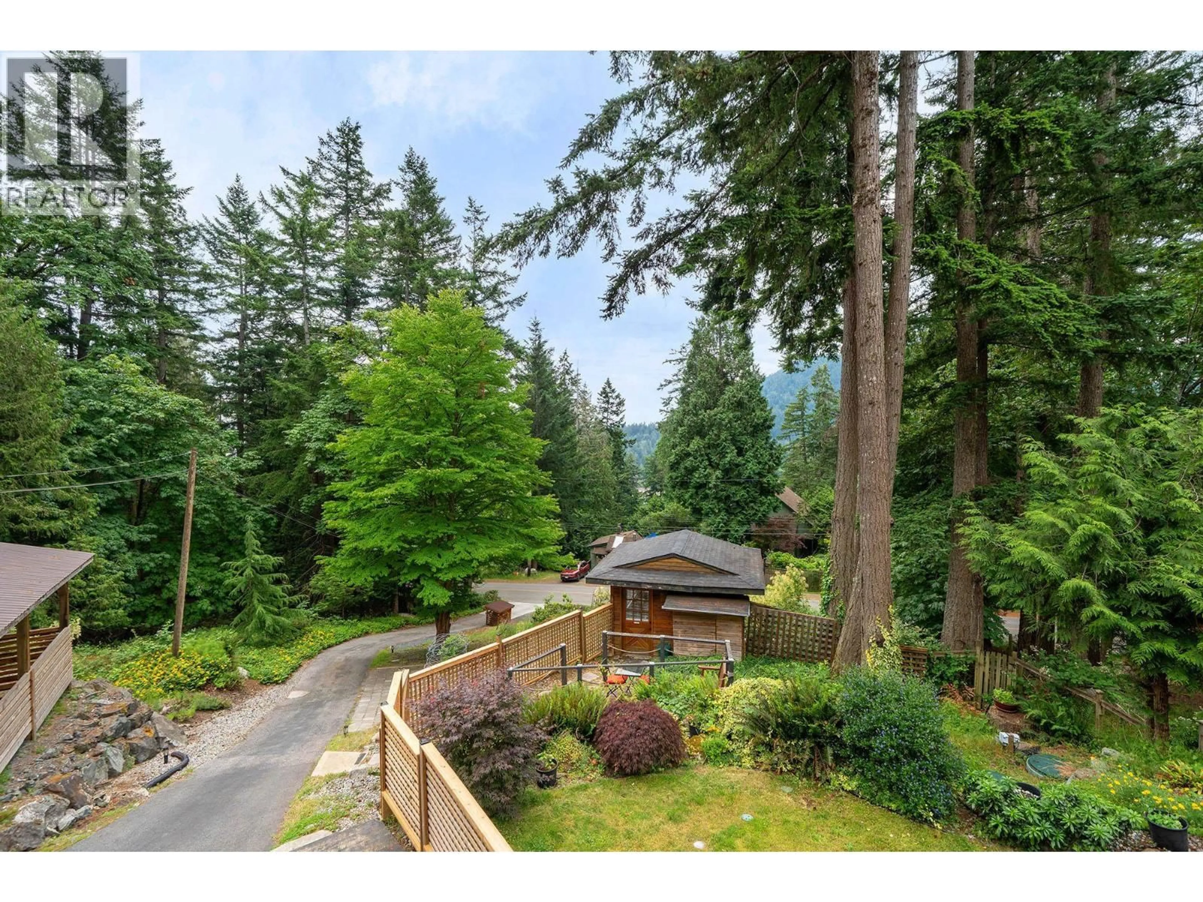 A pic from outside/outdoor area/front of a property/back of a property/a pic from drone, forest/trees view for 1222 MILLER ROAD, Bowen Island British Columbia V0N1G1