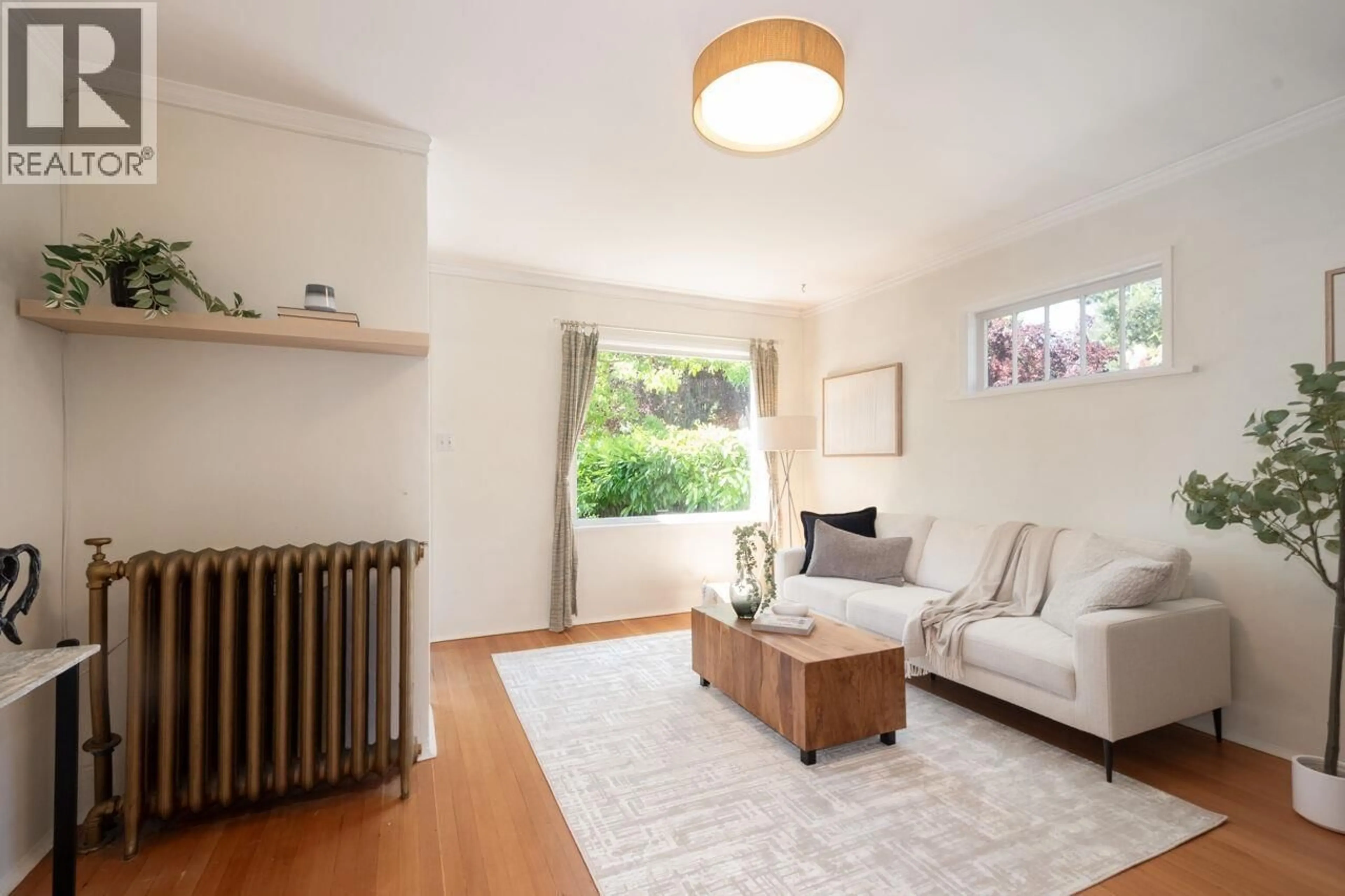Living room with furniture, wood/laminate floor for 2777 TRINITY STREET, Vancouver British Columbia V5K1E6
