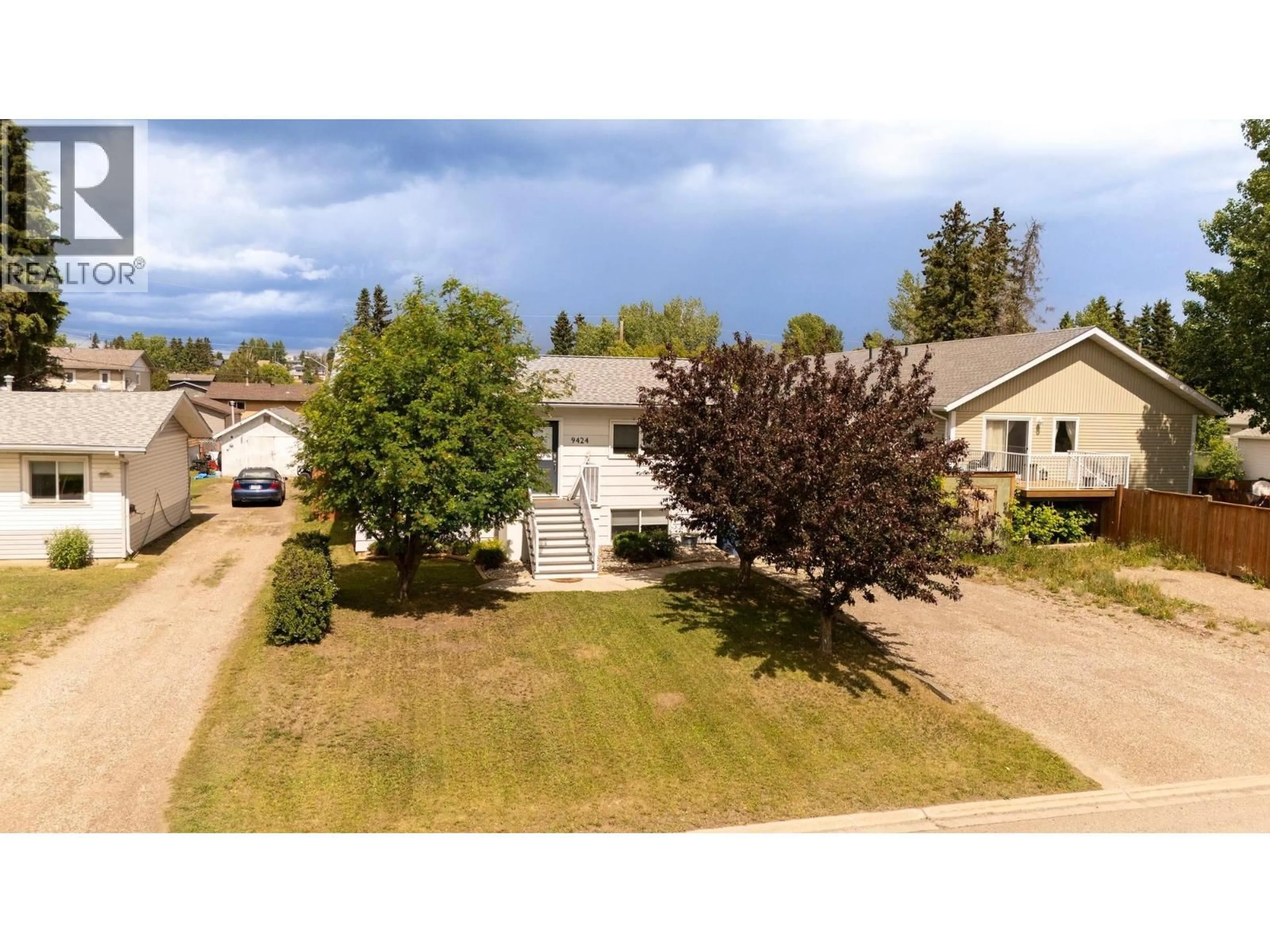 A pic from outside/outdoor area/front of a property/back of a property/a pic from drone, street for 9424 94 AVENUE, Fort St. John British Columbia V1J1G3