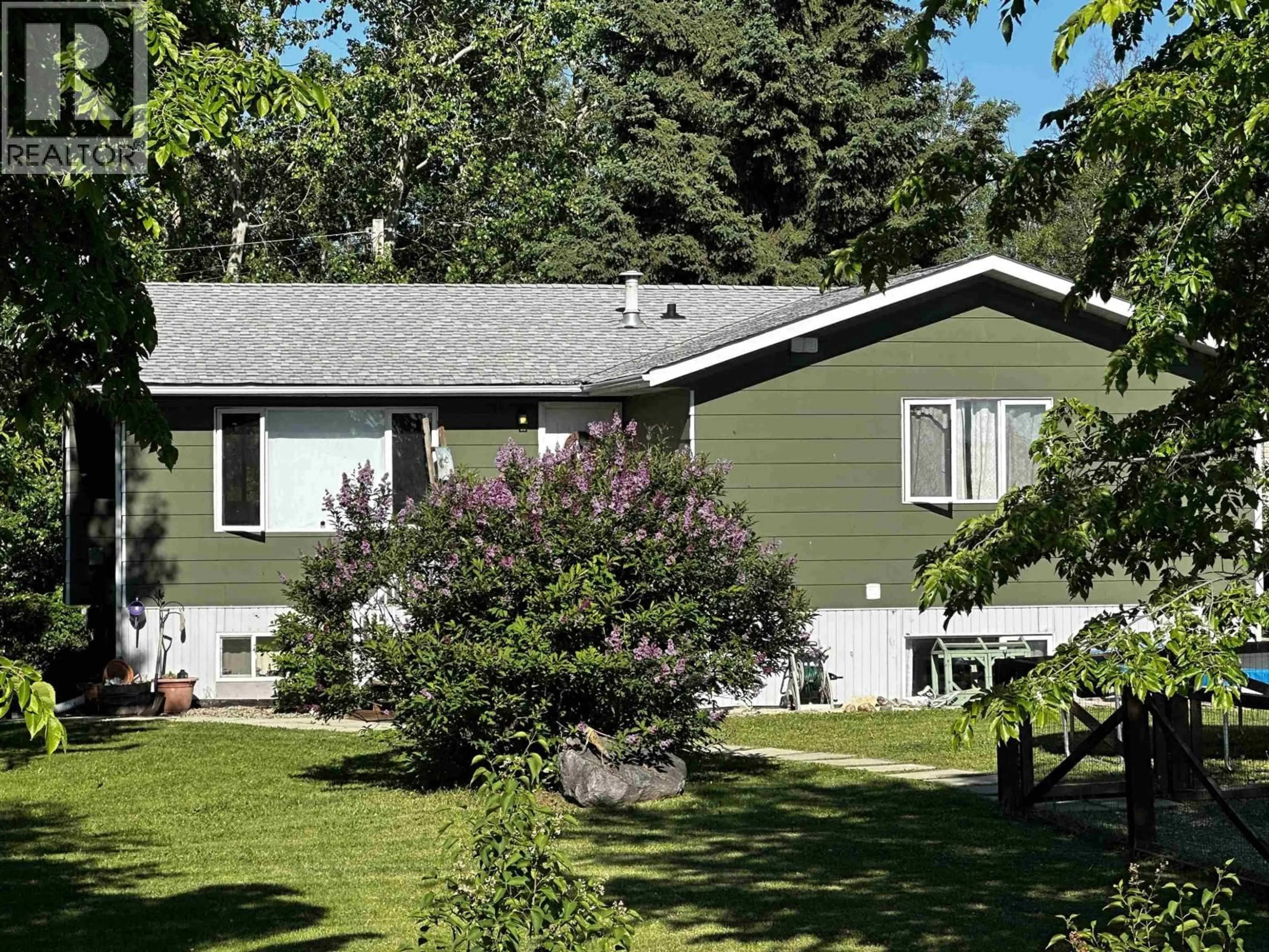Home with vinyl exterior material, street for 10072 257 ROAD, Fort St. John British Columbia V1J8C1