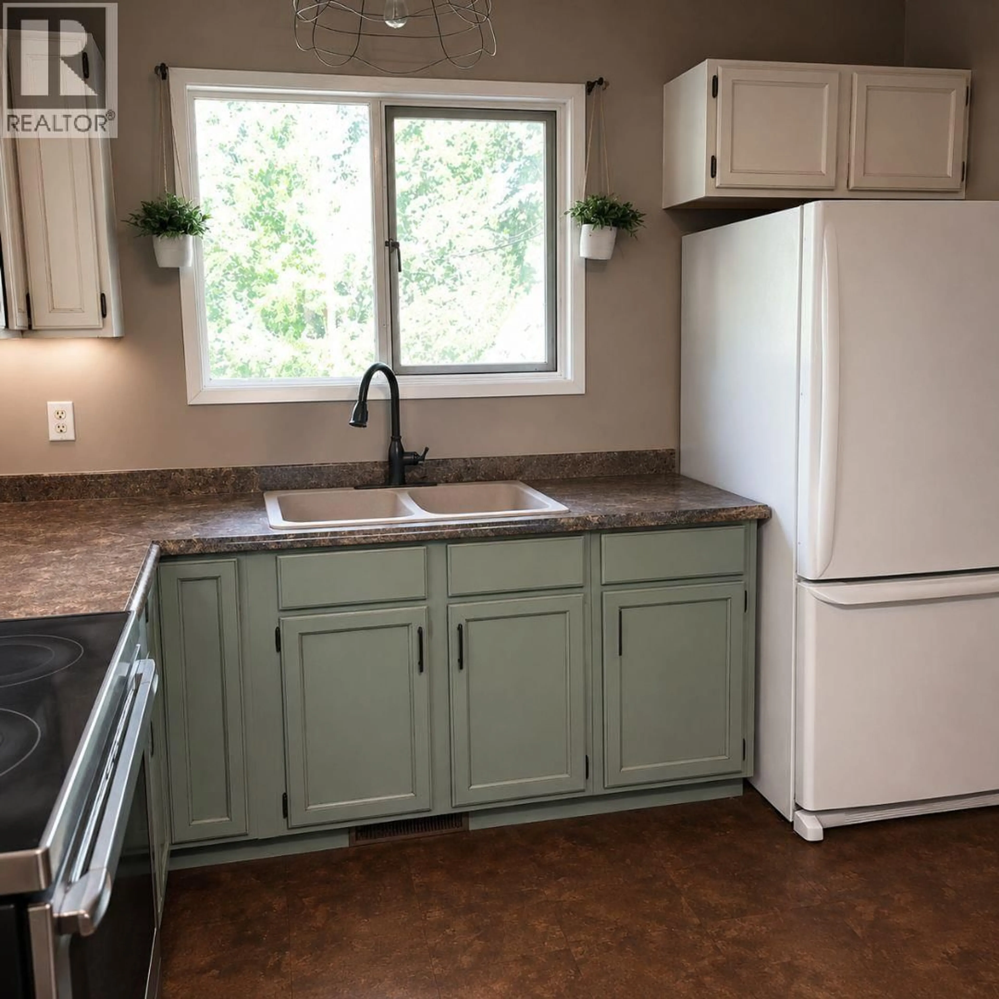 Open concept kitchen, unknown for 10072 257 ROAD, Fort St. John British Columbia V1J8C1