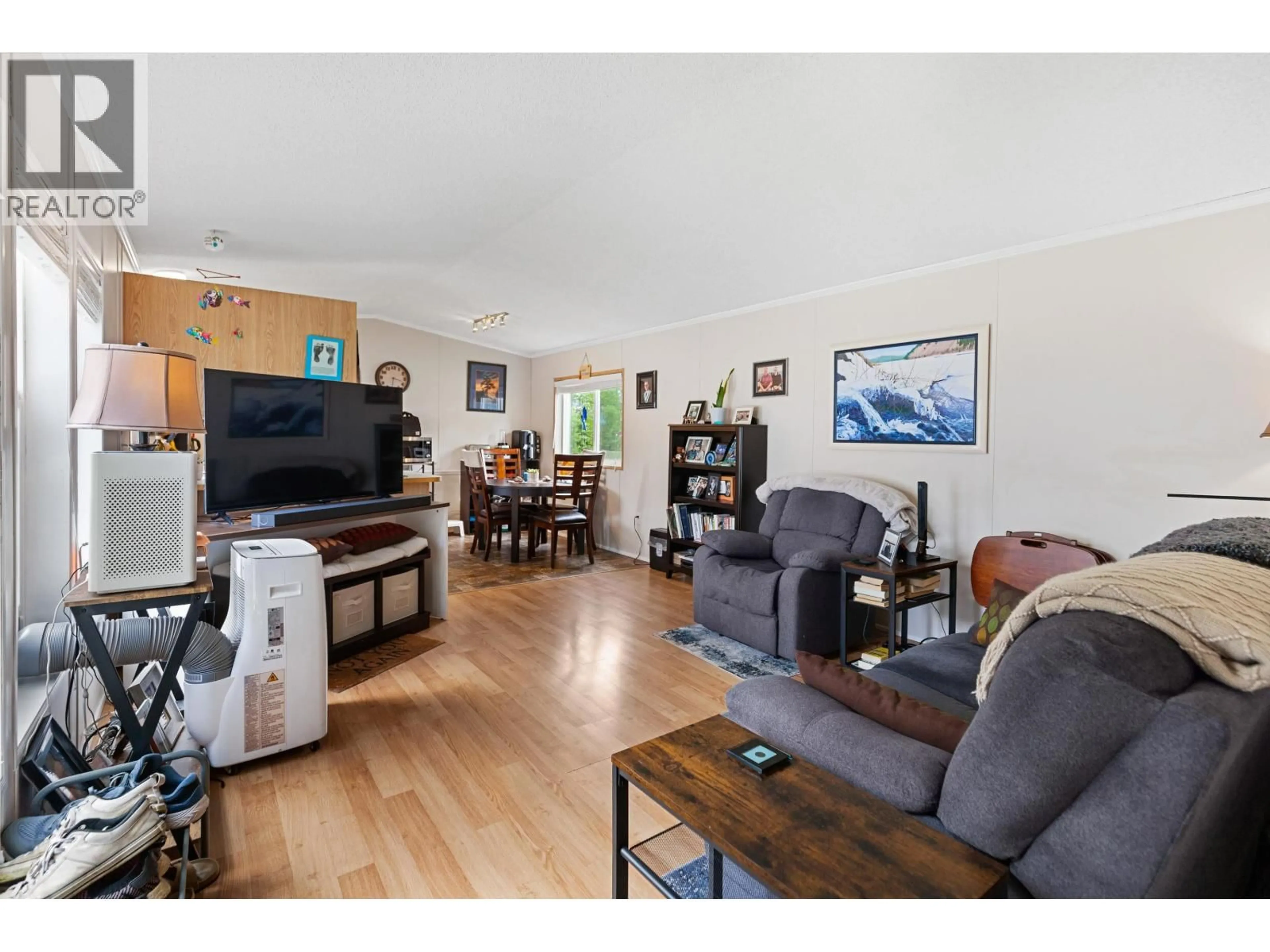 Living room with furniture, wood/laminate floor for 89 - 1000 INVERNESS ROAD, Prince George British Columbia V2K4V1