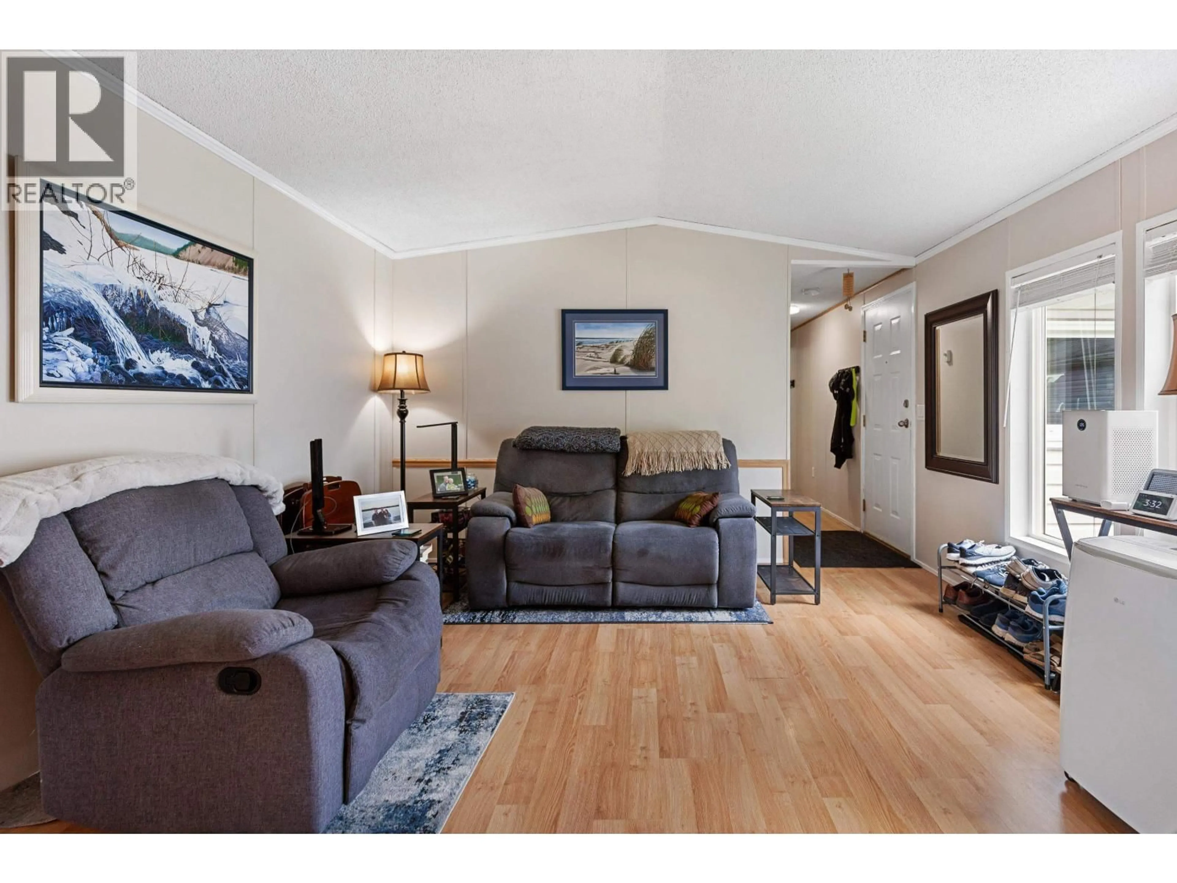 Living room with furniture, wood/laminate floor for 89 - 1000 INVERNESS ROAD, Prince George British Columbia V2K4V1