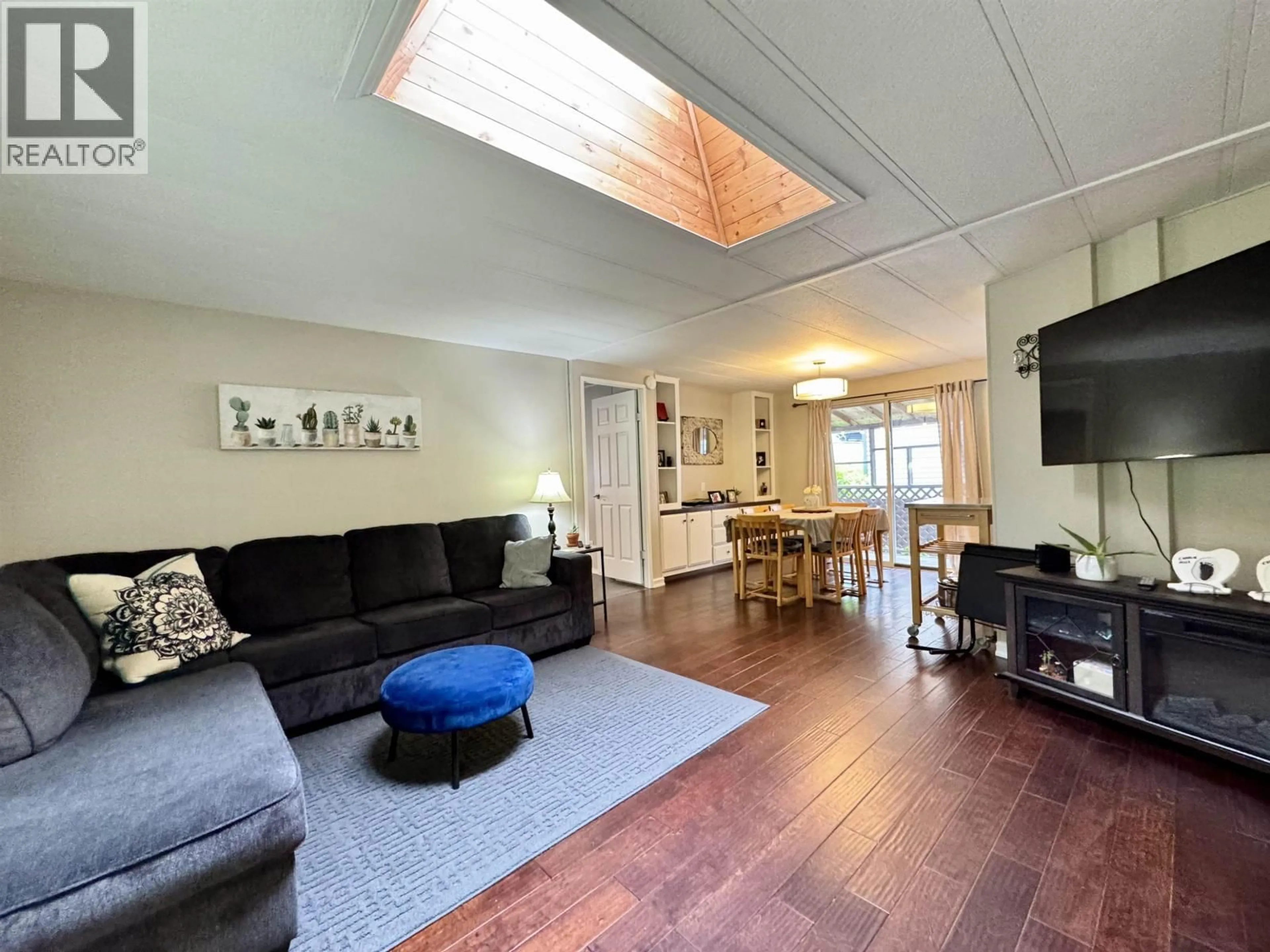Living room with furniture, wood/laminate floor for 90 HAYSVALE DRIVE, Prince Rupert British Columbia V8J3Z1