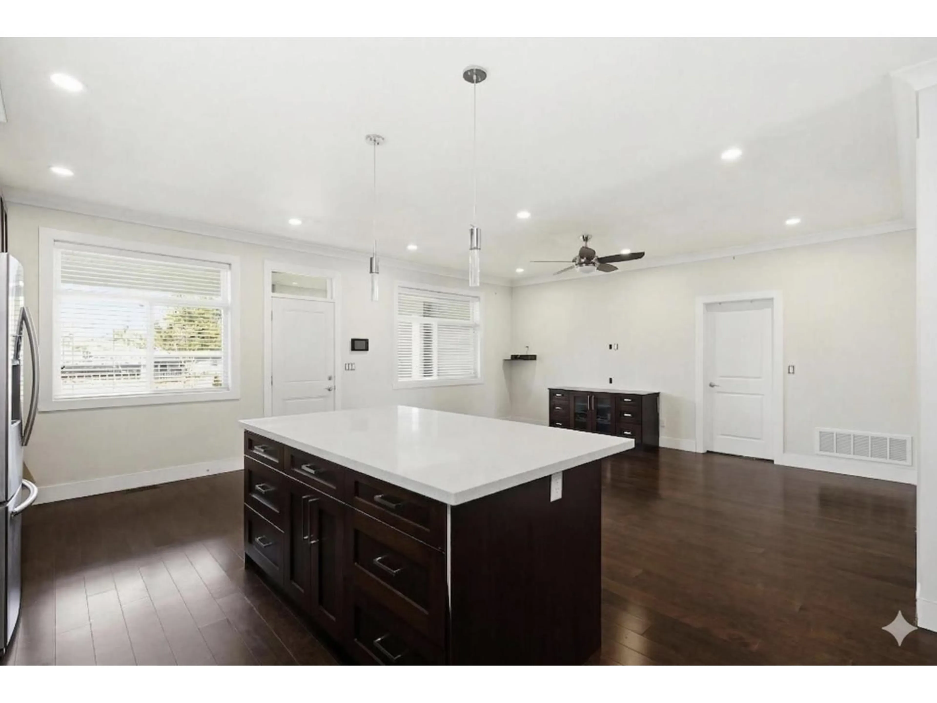 Open concept kitchen, wood/laminate floor for 32141 HILLCREST AVENUE, Mission British Columbia V2V1L3