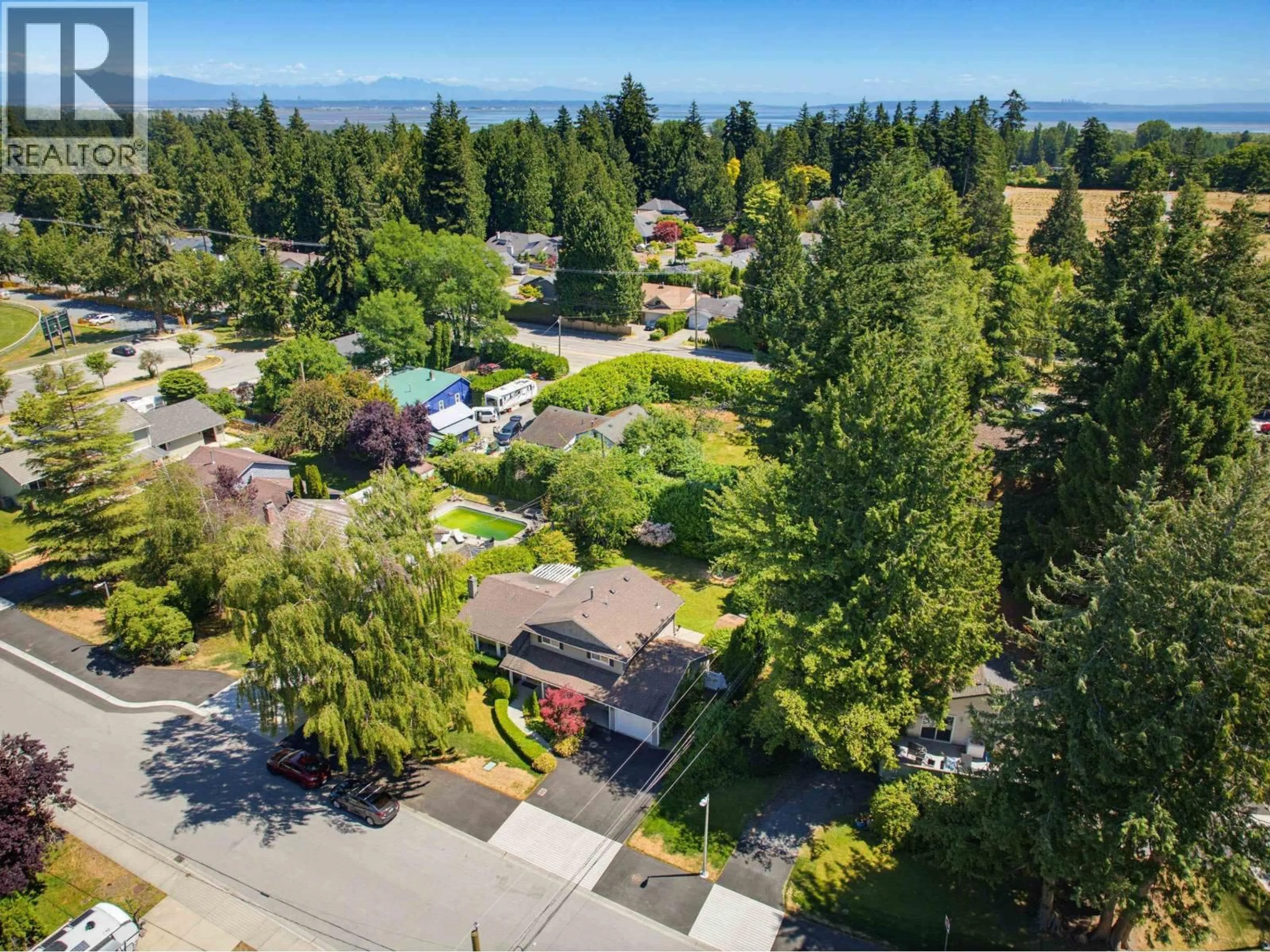 A pic from outside/outdoor area/front of a property/back of a property/a pic from drone, unknown for 856 55A STREET, Delta British Columbia V4M3M4