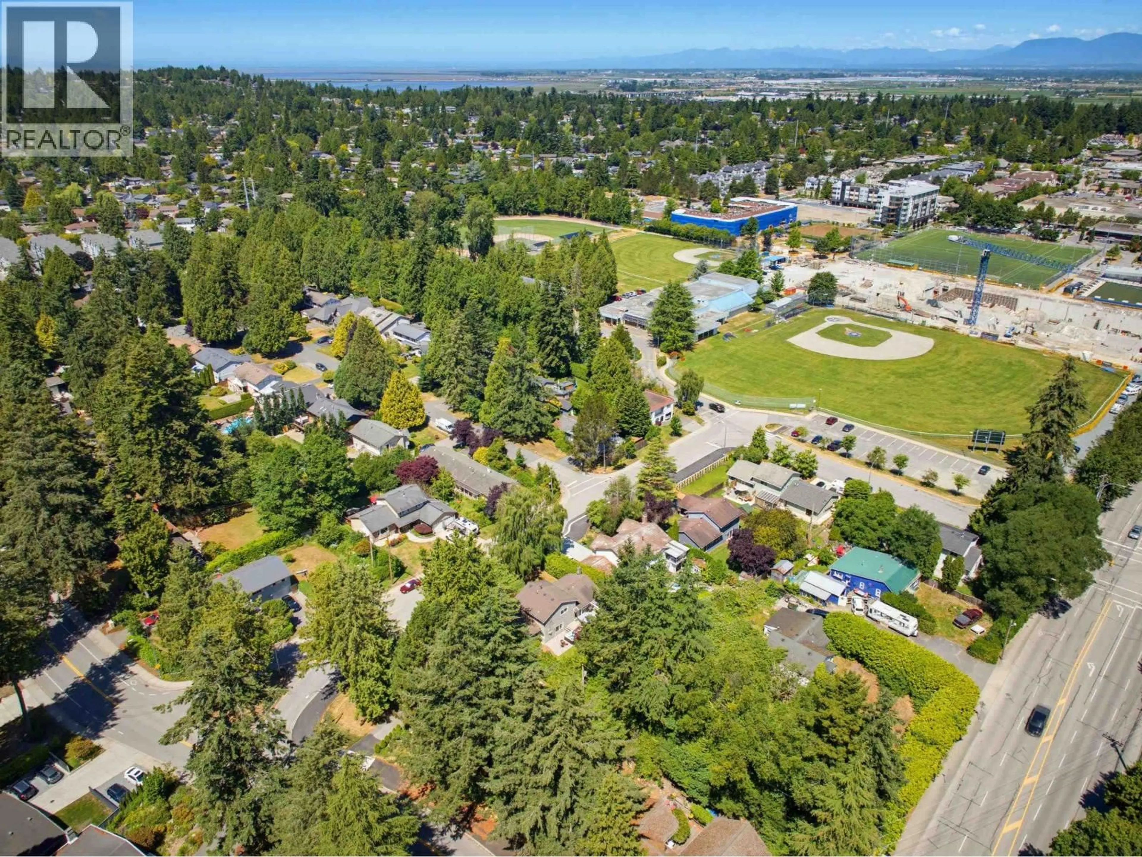 A pic from outside/outdoor area/front of a property/back of a property/a pic from drone, mountain view for 856 55A STREET, Delta British Columbia V4M3M4