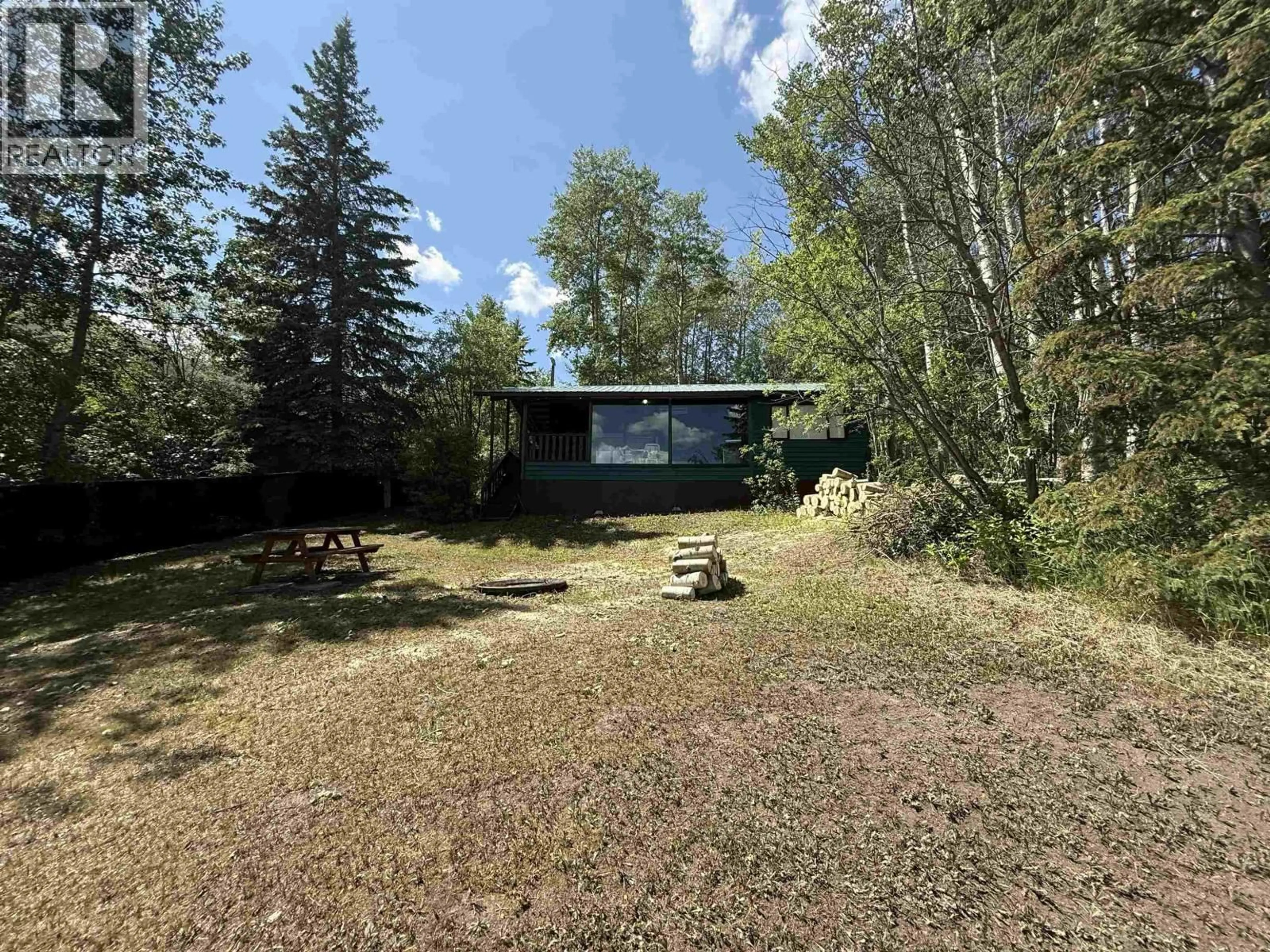 A pic from outside/outdoor area/front of a property/back of a property/a pic from drone, forest/trees view for 13789 GOLF COURSE ROAD, Fort St. John British Columbia V0H1H0