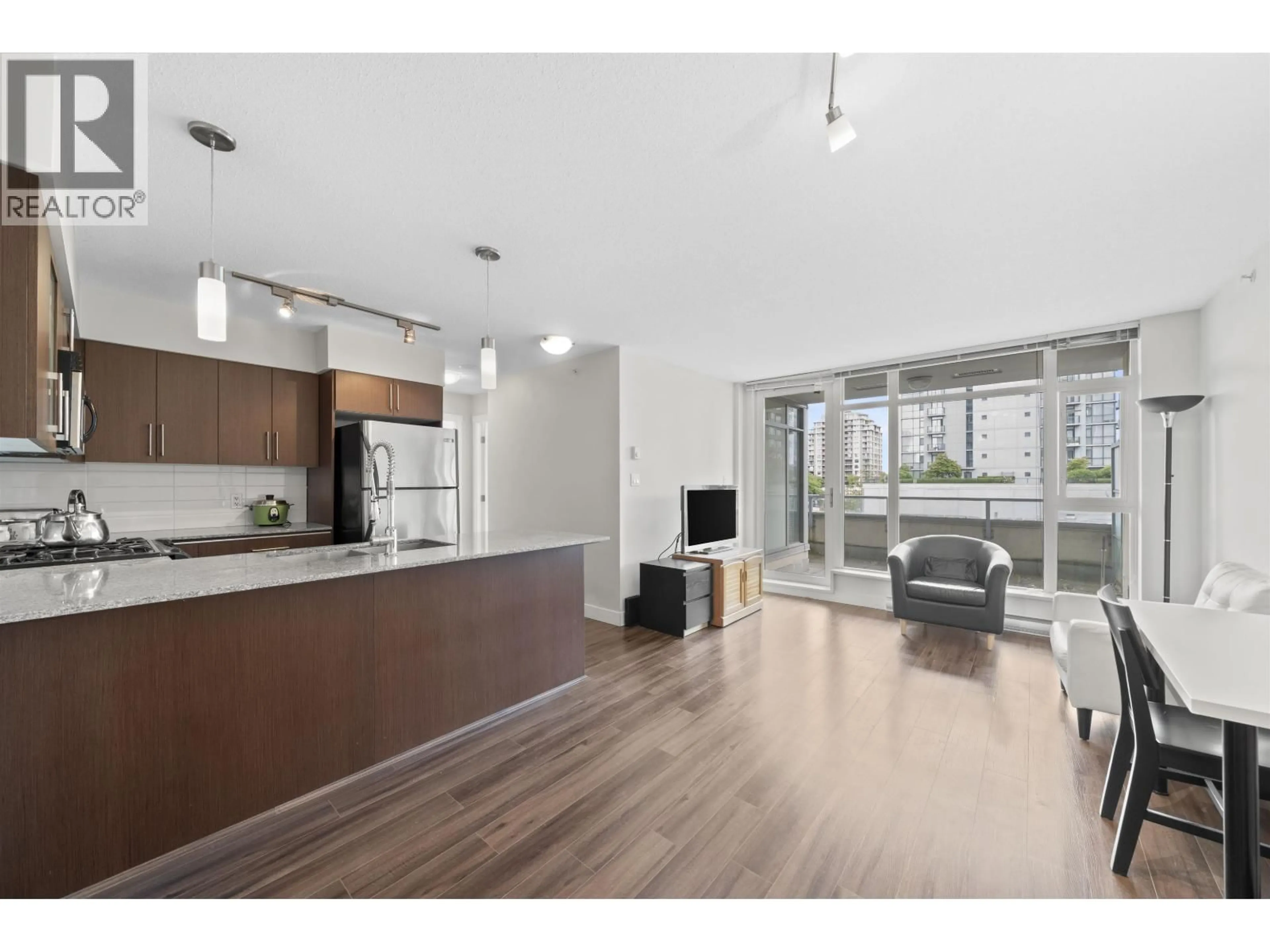 Open concept kitchen, wood/laminate floor for 509 - 8068 WESTMINSTER HIGHWAY, Richmond British Columbia V6X0C6