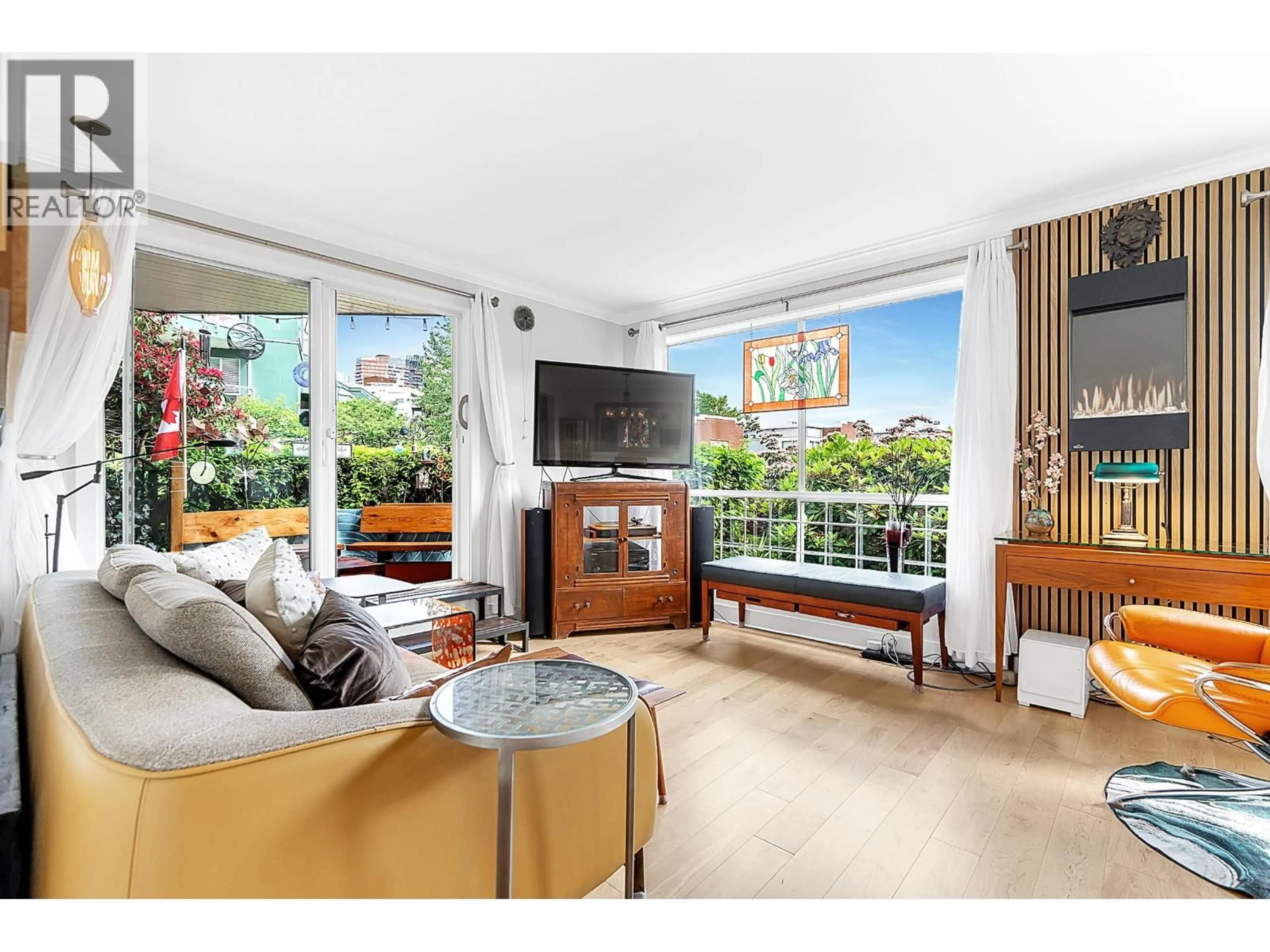 Living room with furniture, unknown for 102 - 1530 MARINER WALK, Vancouver British Columbia V6J4X9
