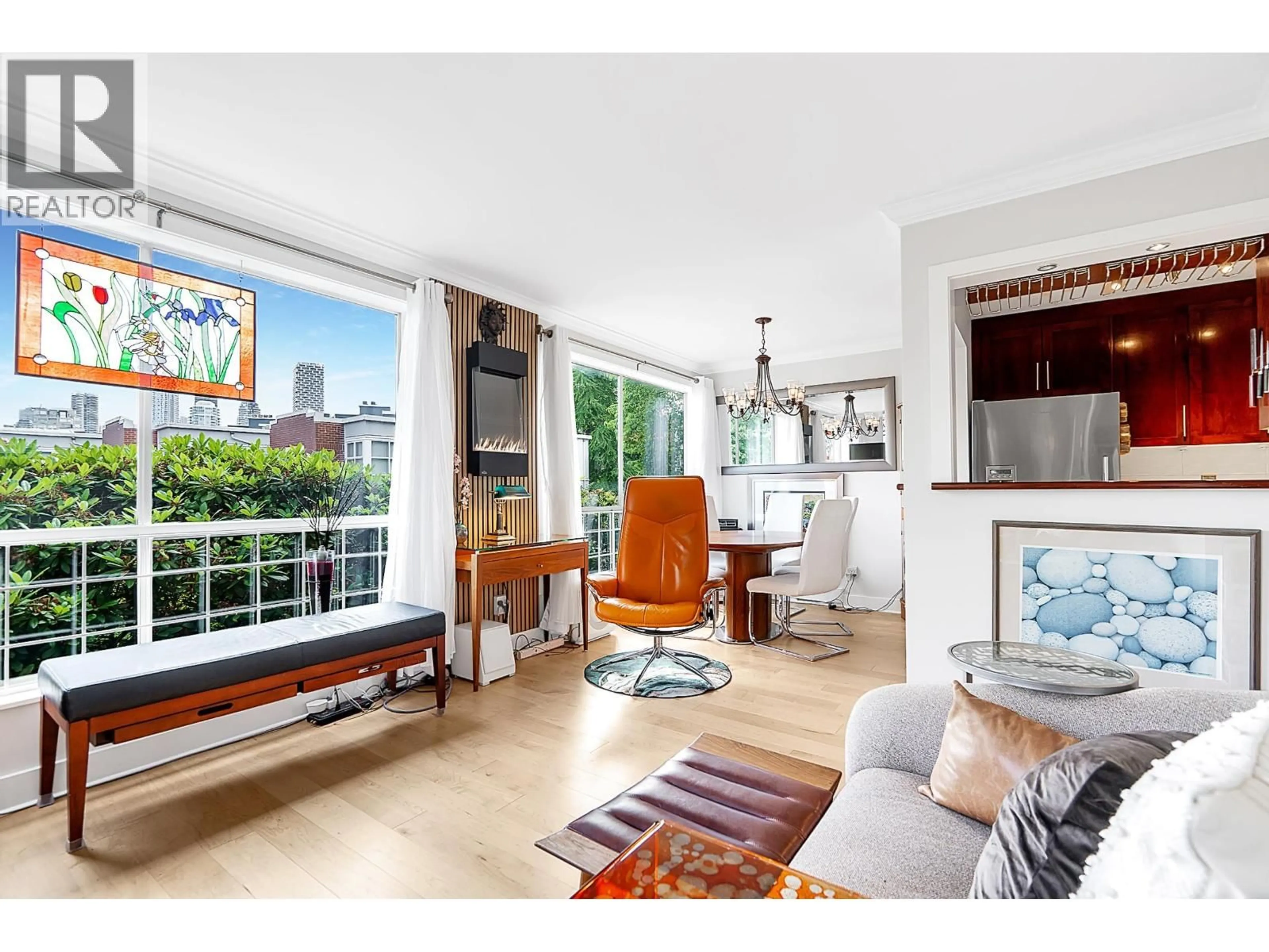 Living room with furniture, unknown for 102 - 1530 MARINER WALK, Vancouver British Columbia V6J4X9