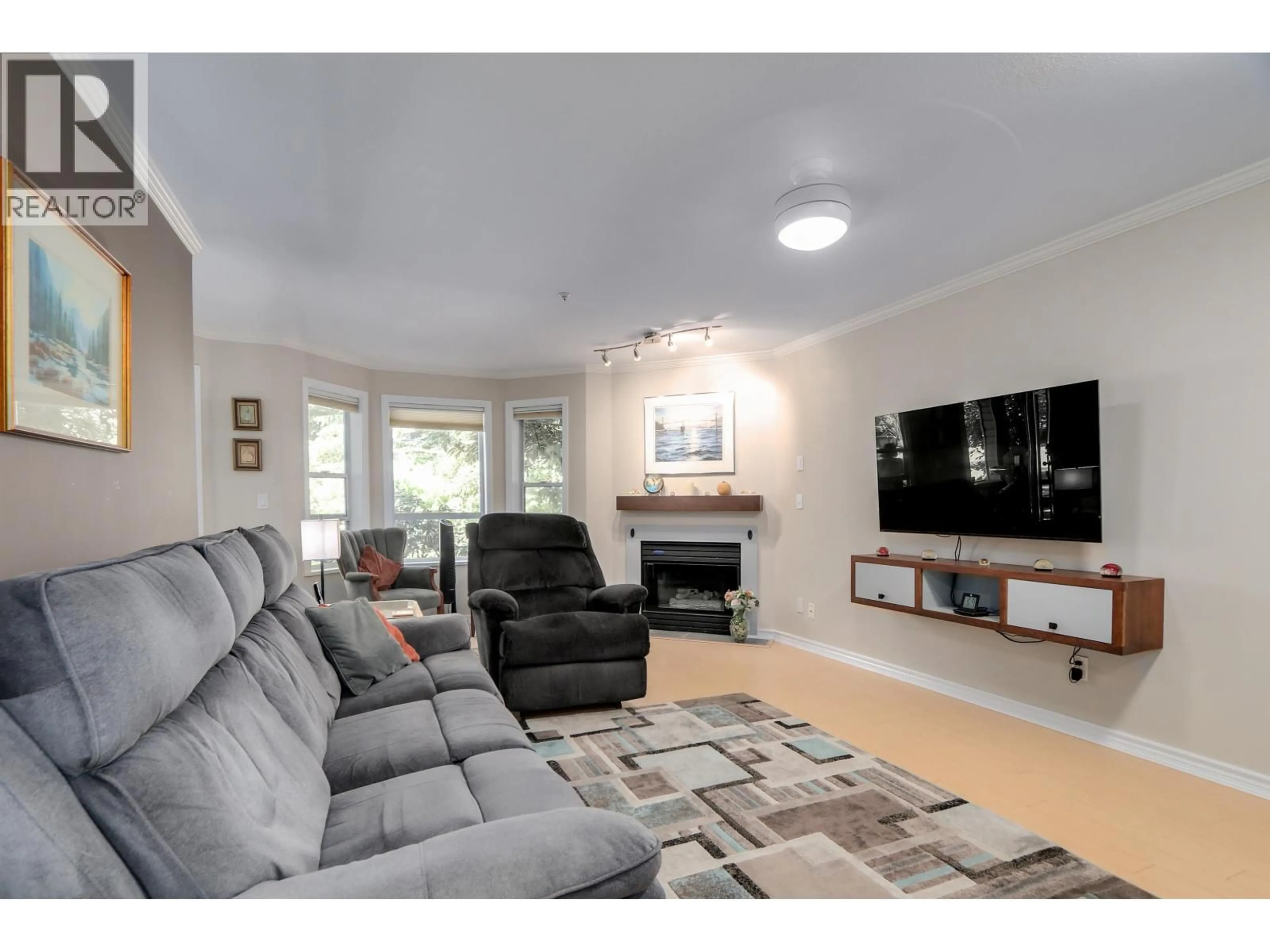 Living room with furniture, unknown for 110 - 1150 LYNN VALLEY ROAD, North Vancouver British Columbia V7J1Z9