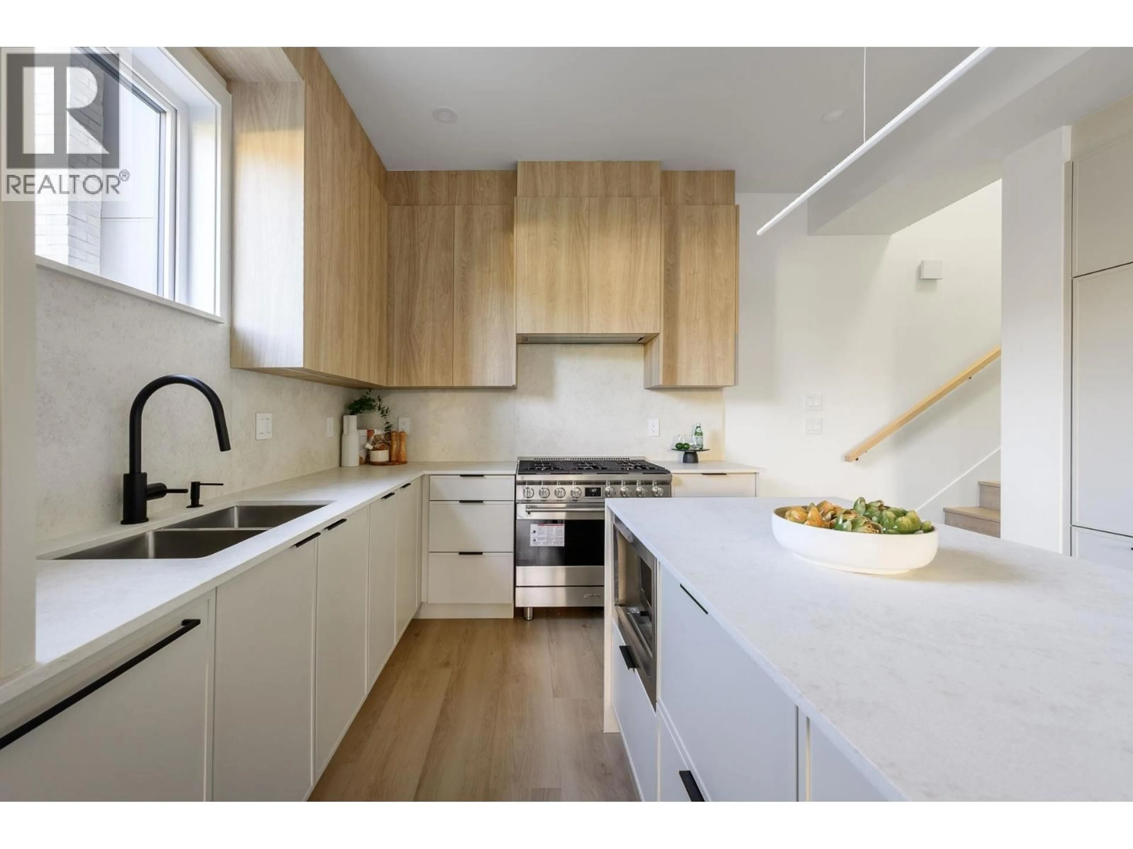 Contemporary kitchen, wood/laminate floor for 102 - 1132 MADORE AVENUE, Coquitlam British Columbia V3K3B9