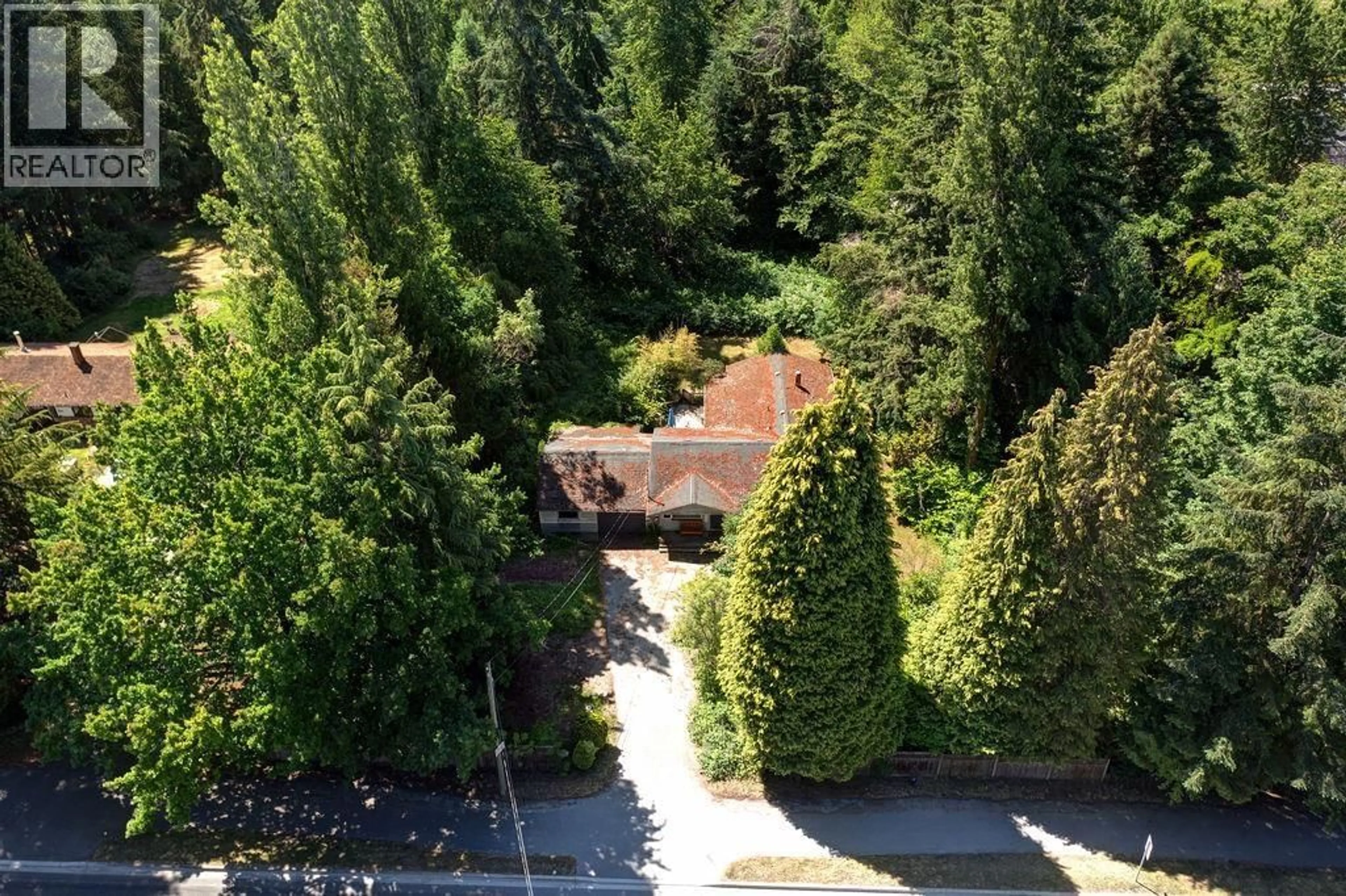 A pic from outside/outdoor area/front of a property/back of a property/a pic from drone, forest/trees view for 999 REED ROAD, Gibsons British Columbia V0N1V7