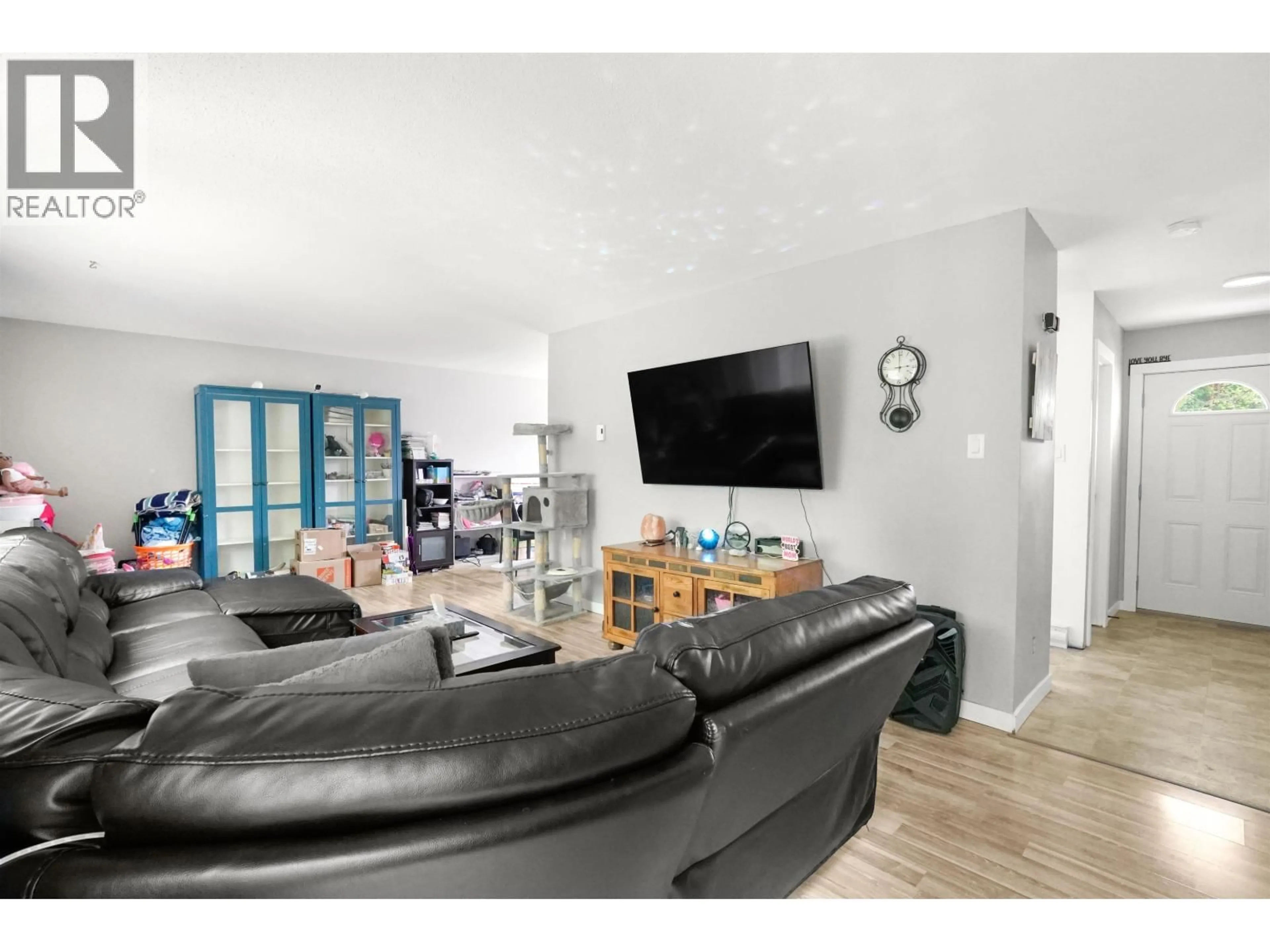 Living room with furniture, wood/laminate floor for 1337 TWEEDSMUIR AVENUE, Kitimat British Columbia V8C1C2