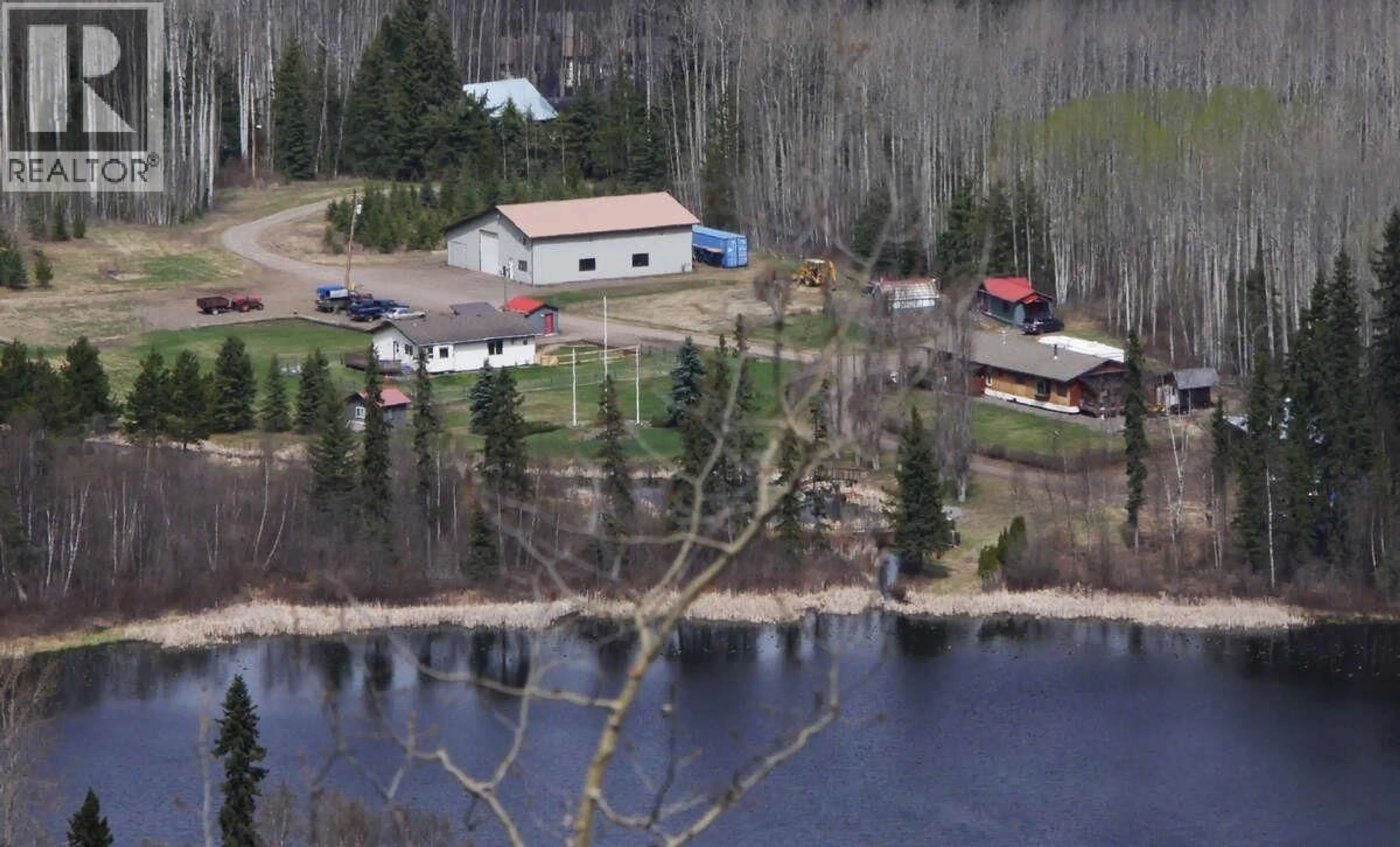 A pic from outside/outdoor area/front of a property/back of a property/a pic from drone, water/lake/river/ocean view for 1055 HUDSON BAY MOUNTAIN ROAD, Smithers British Columbia V0J2N4